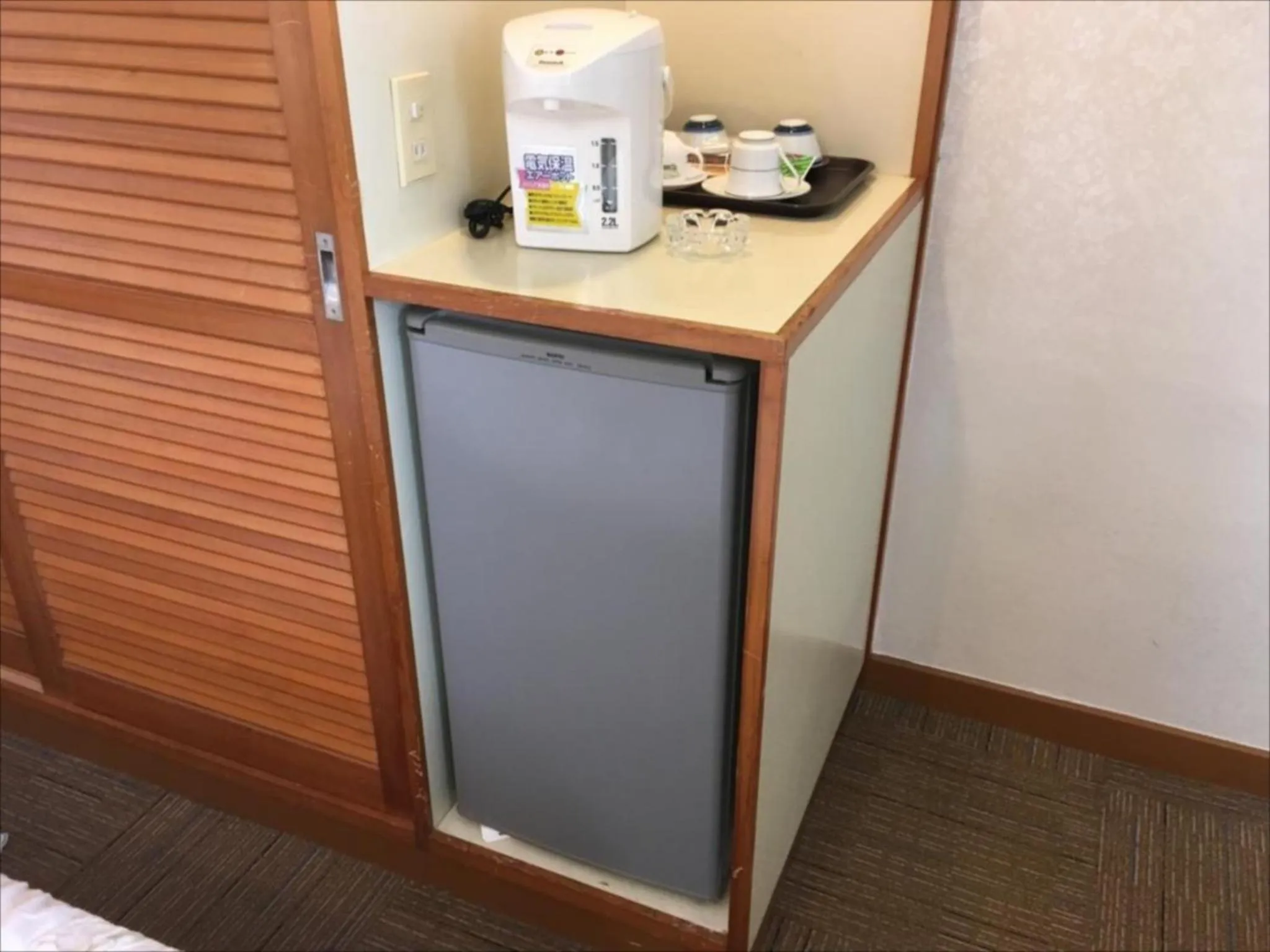 Photo of the whole room in Sunrise Hotel Okinawa-どこか懐かしいレトロ宿軽朝食付