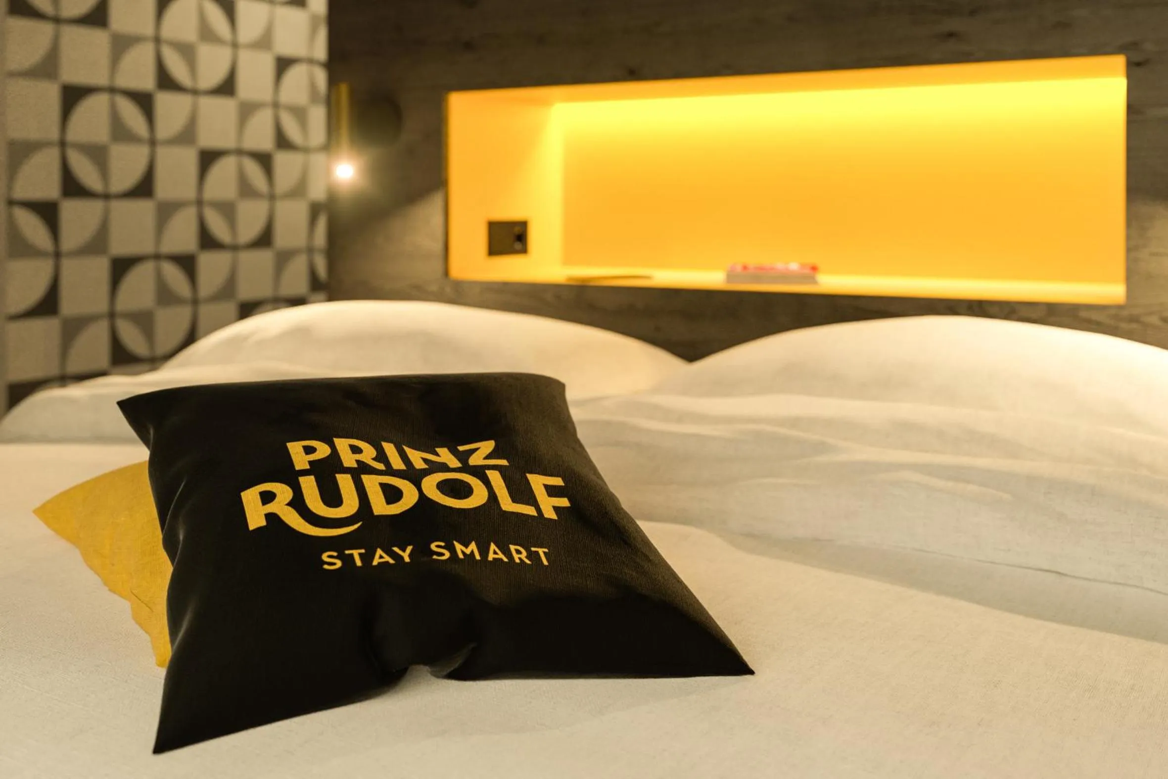 Bed in Prinz Rudolf Smart Hotel