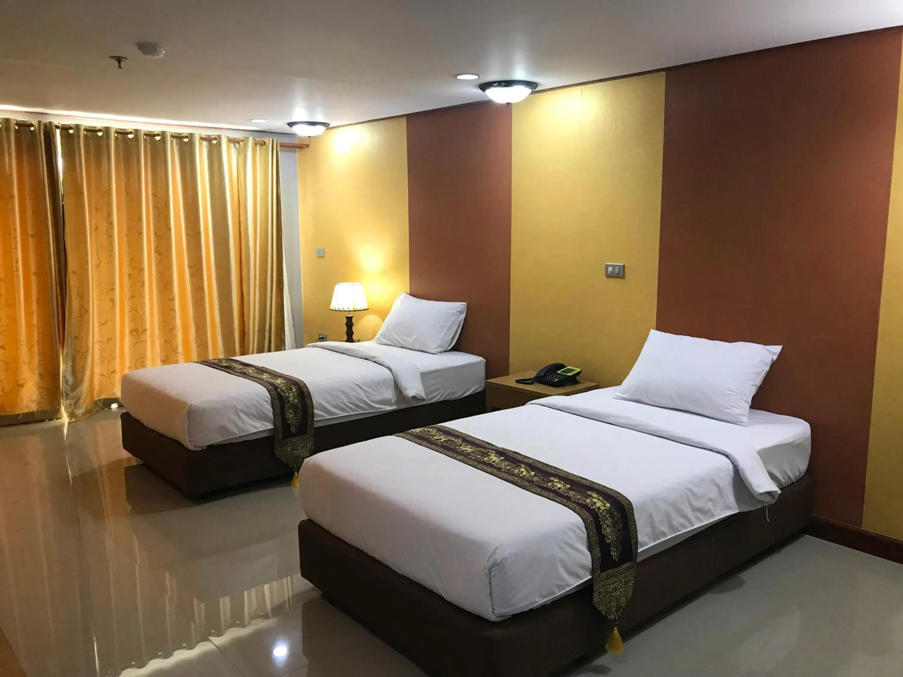 Bed in Toh Buk Seng Ayutthaya Hotel