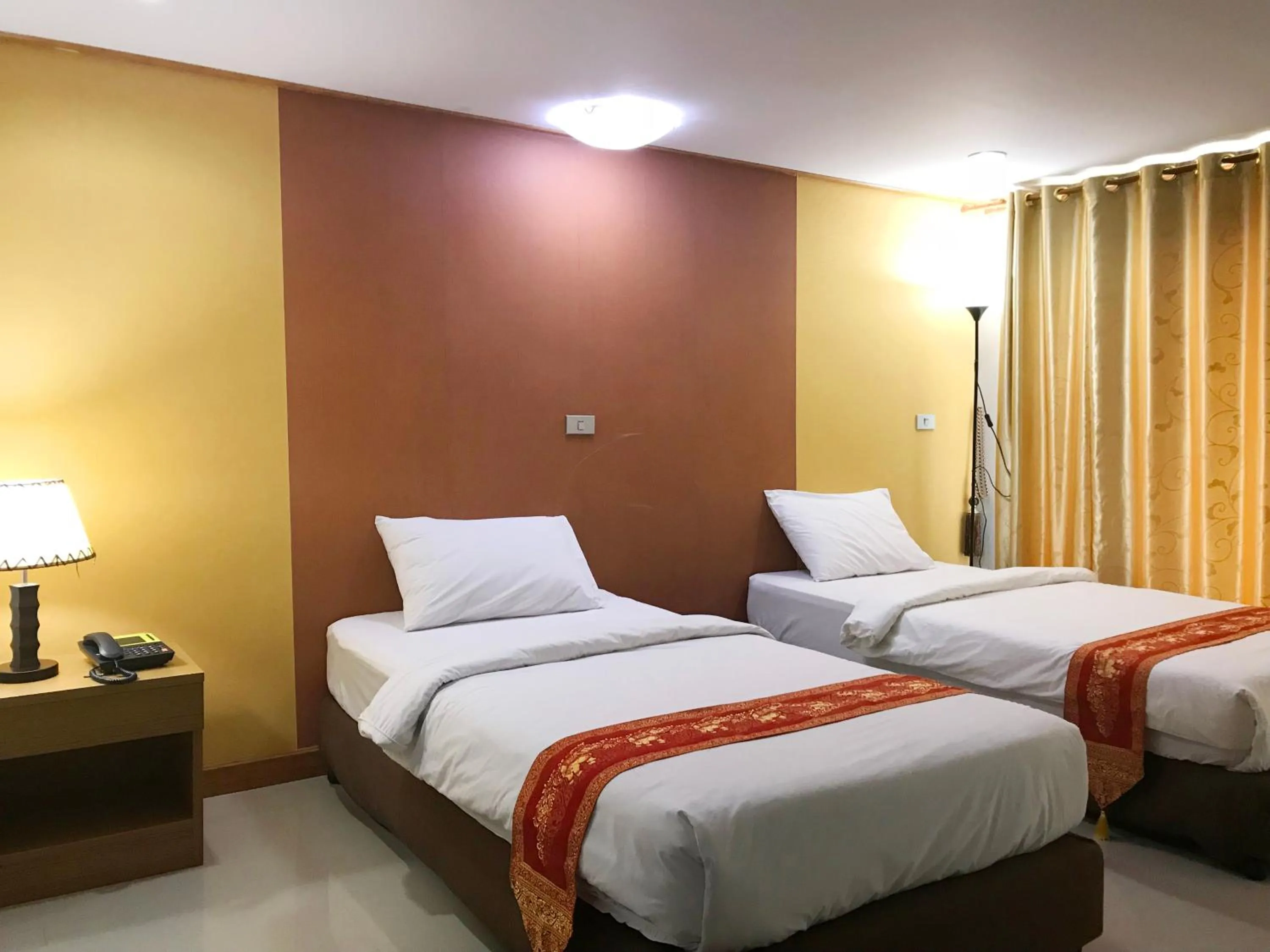 Bed in Toh Buk Seng Ayutthaya Hotel