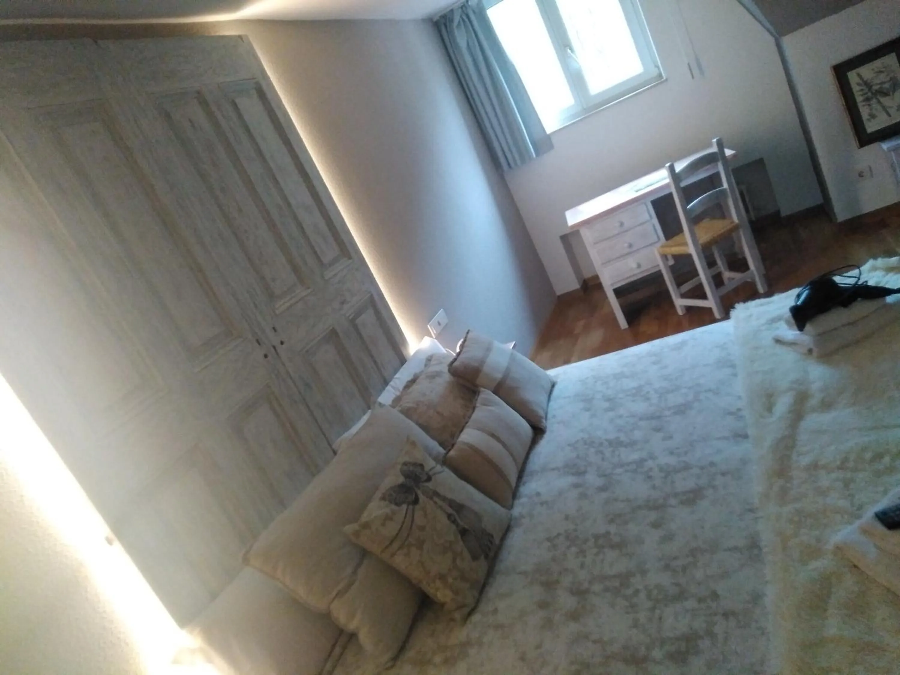 Seating area, Bed in Balneario Casa Pallotti