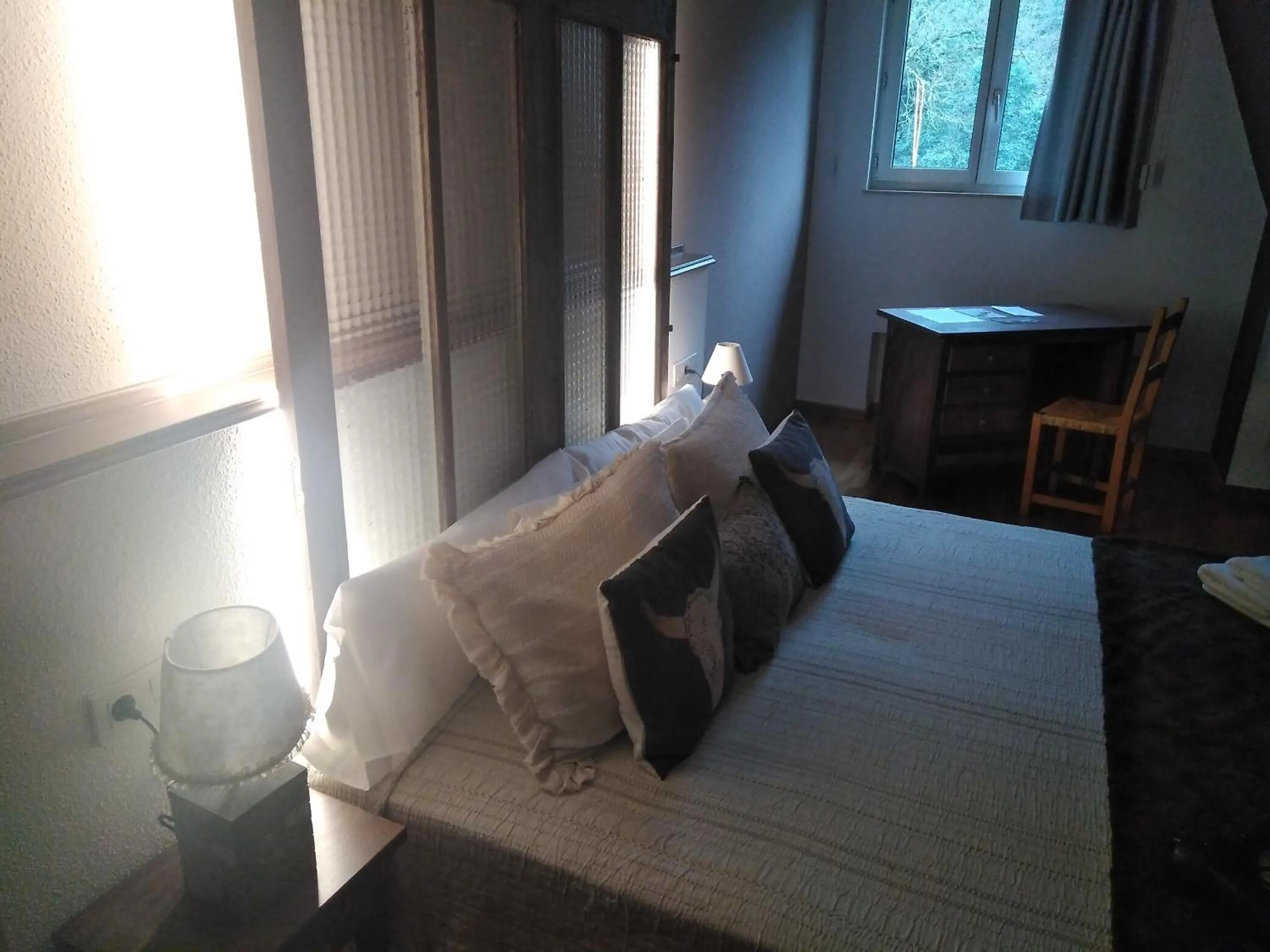 Seating area, Bed in Balneario Casa Pallotti