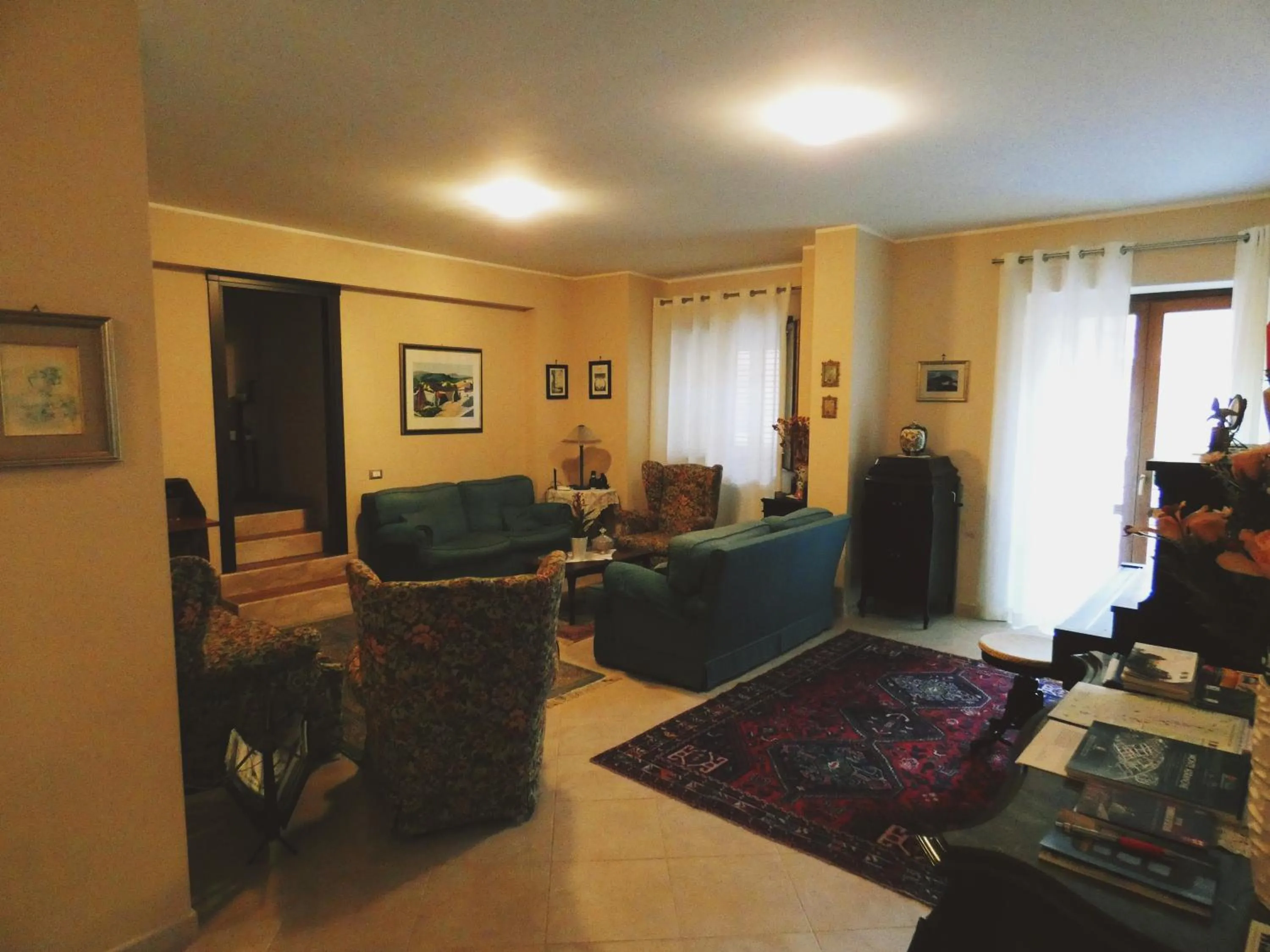 Communal lounge/ TV room in B&B del Corso