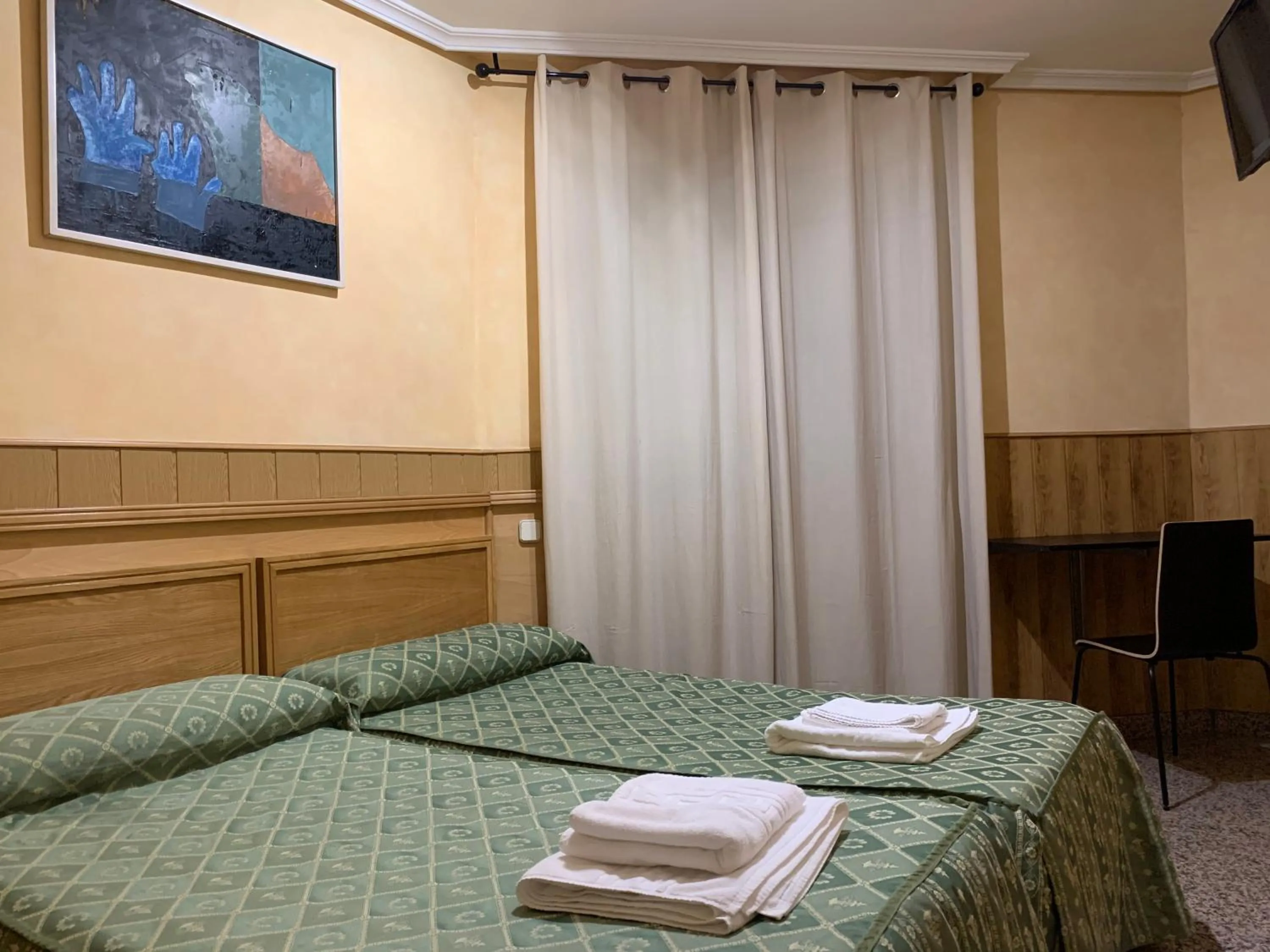 Bed in Hostal Juan XXIII