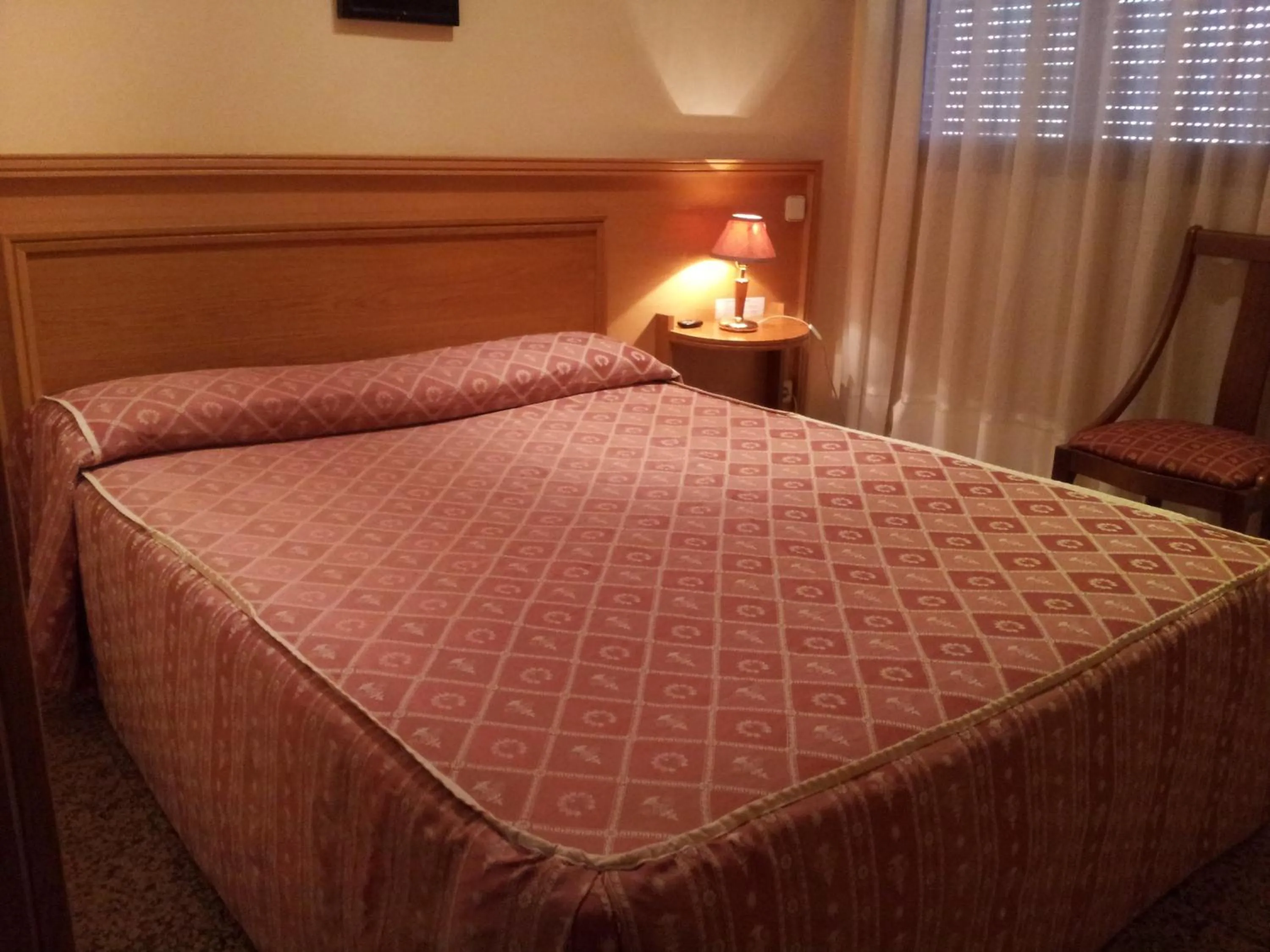 Bed in Hostal Juan XXIII