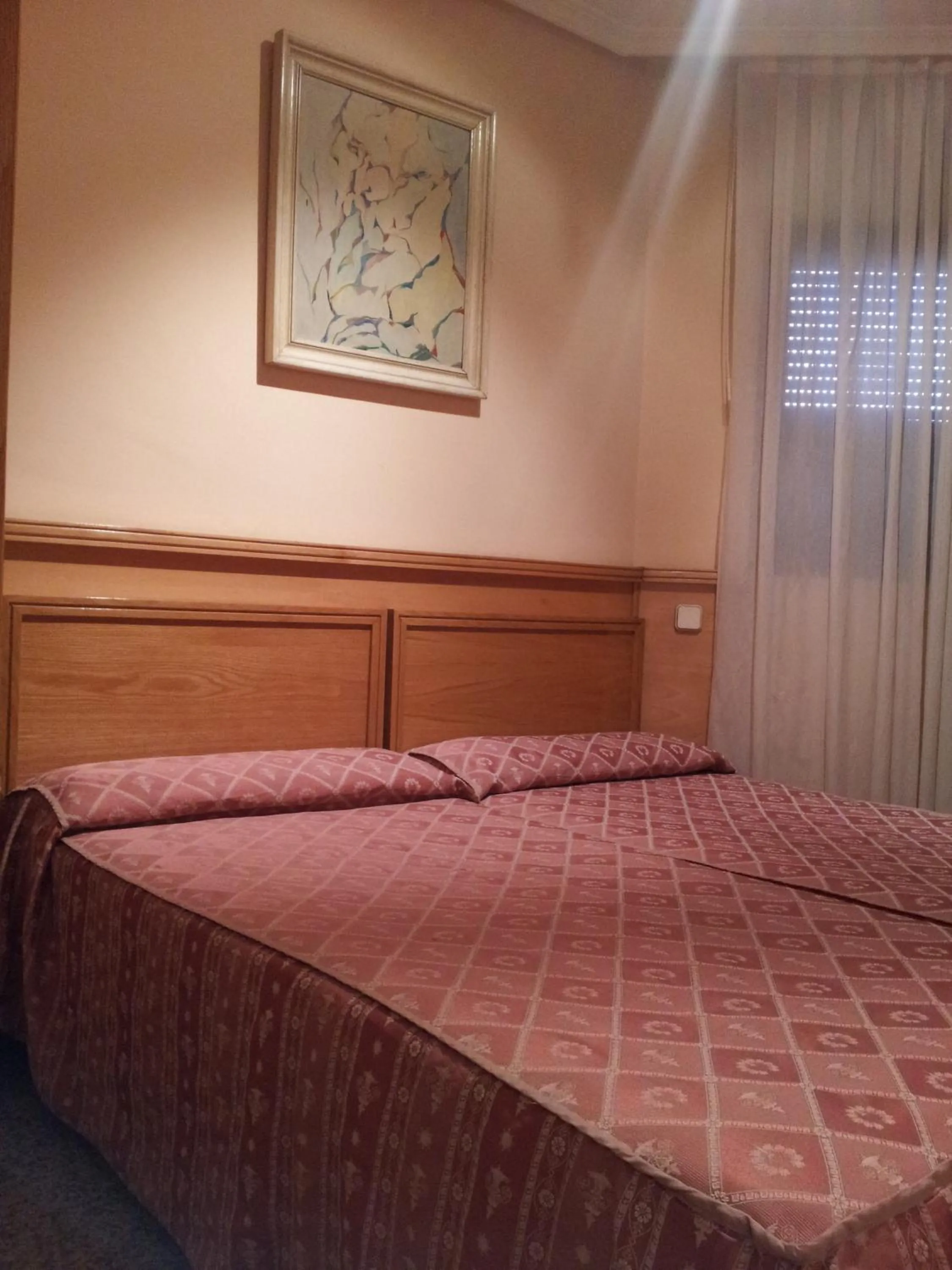 Bed in Hostal Juan XXIII