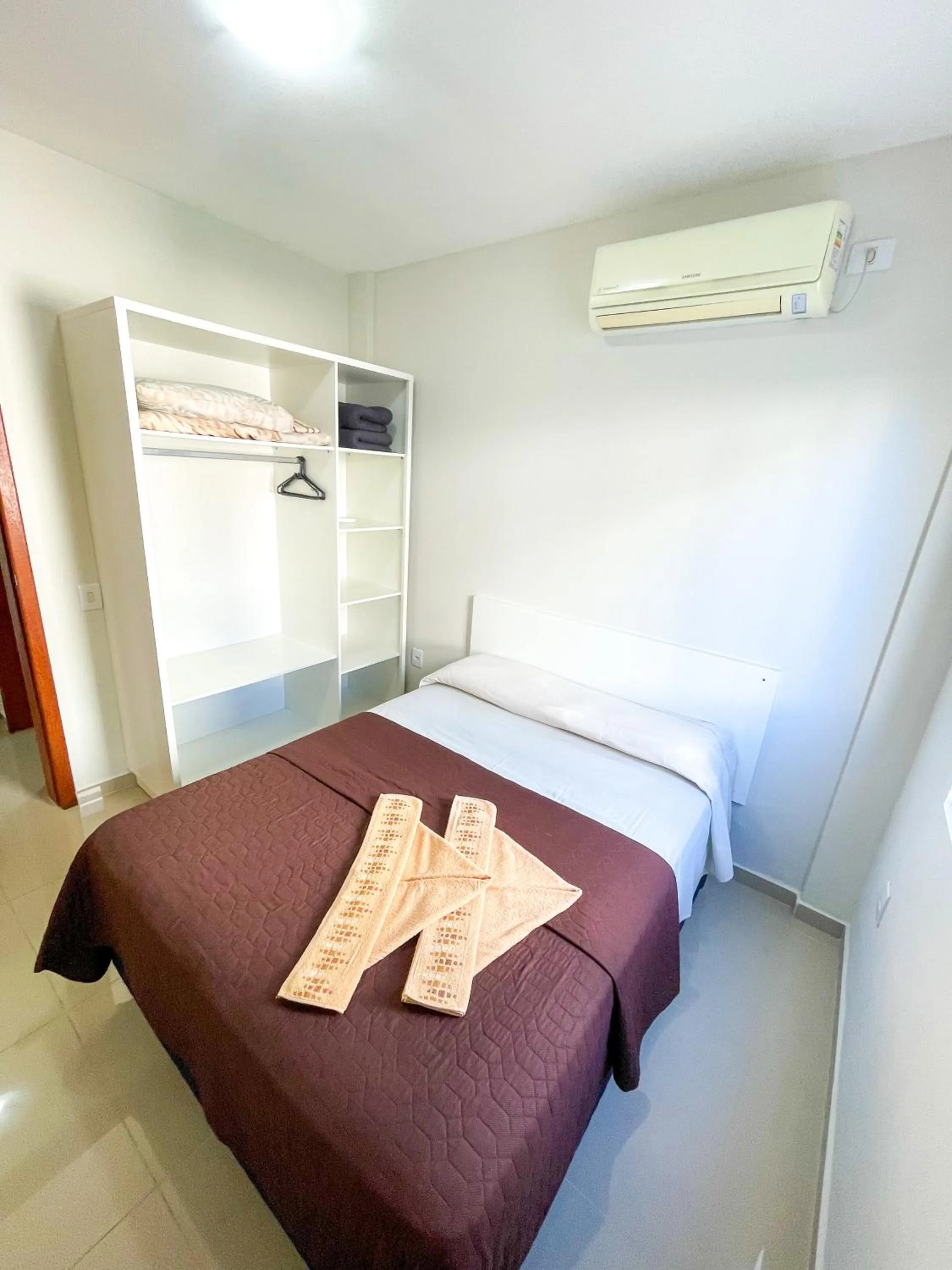 Bed in Pousada Gomes