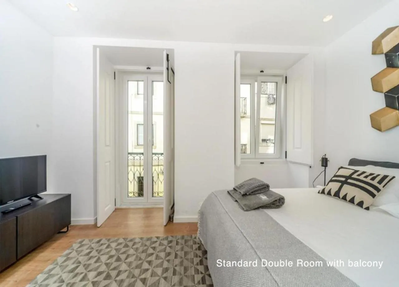 Bedroom, Bed in Bairro House Lisbon Charming Suites