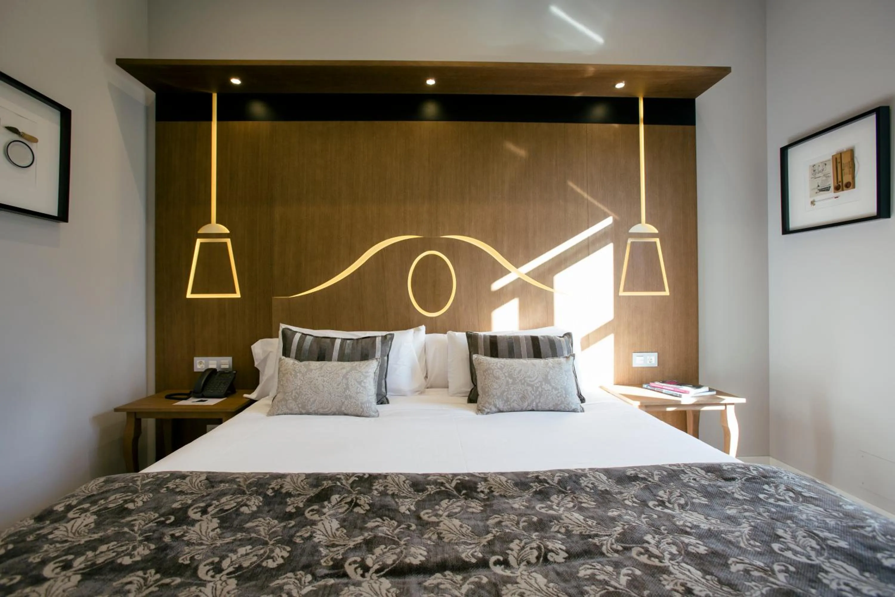 Bed in Legazpi Doce Rooms & Suites