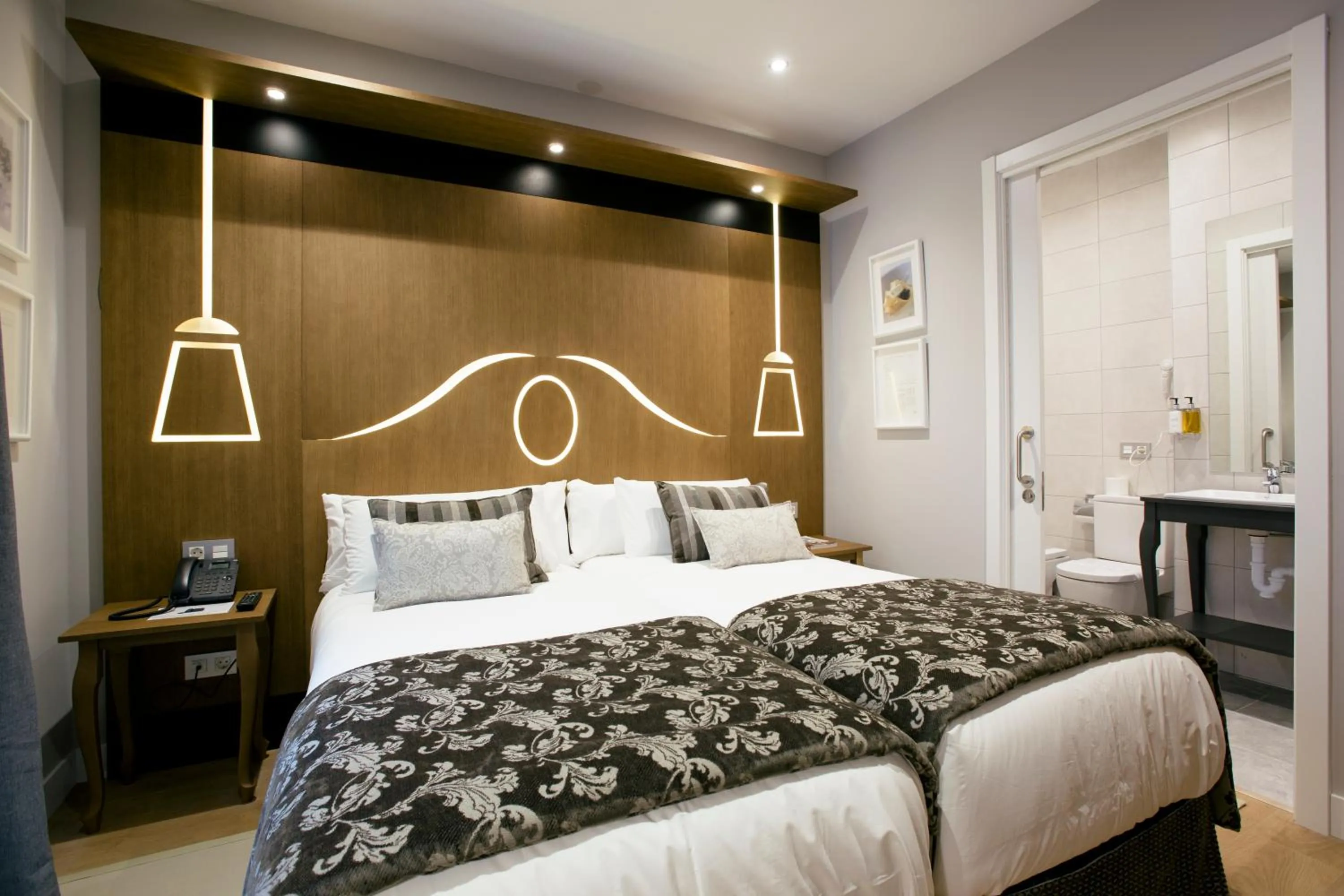 Decorative detail, Bed in Legazpi Doce Rooms & Suites