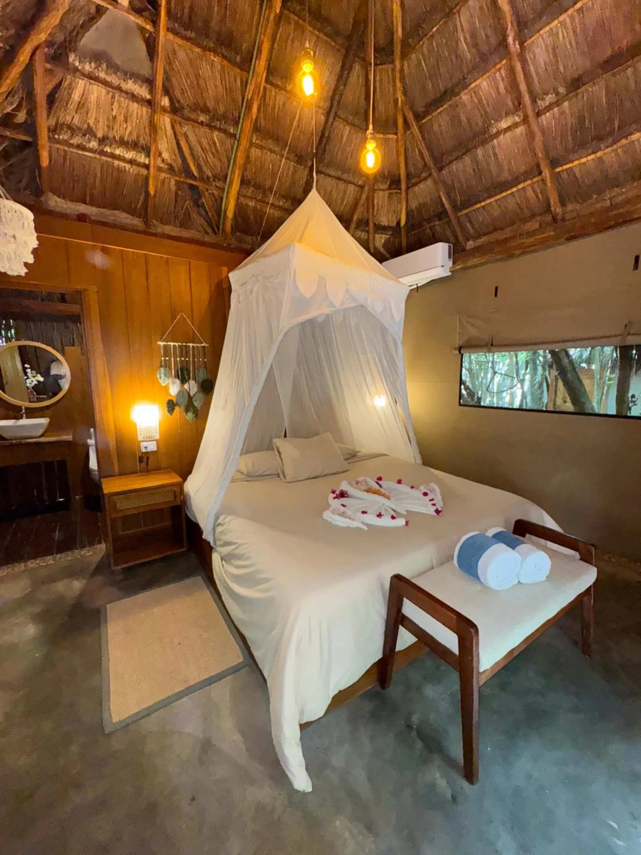 Bed in Akumal Natura Glamping