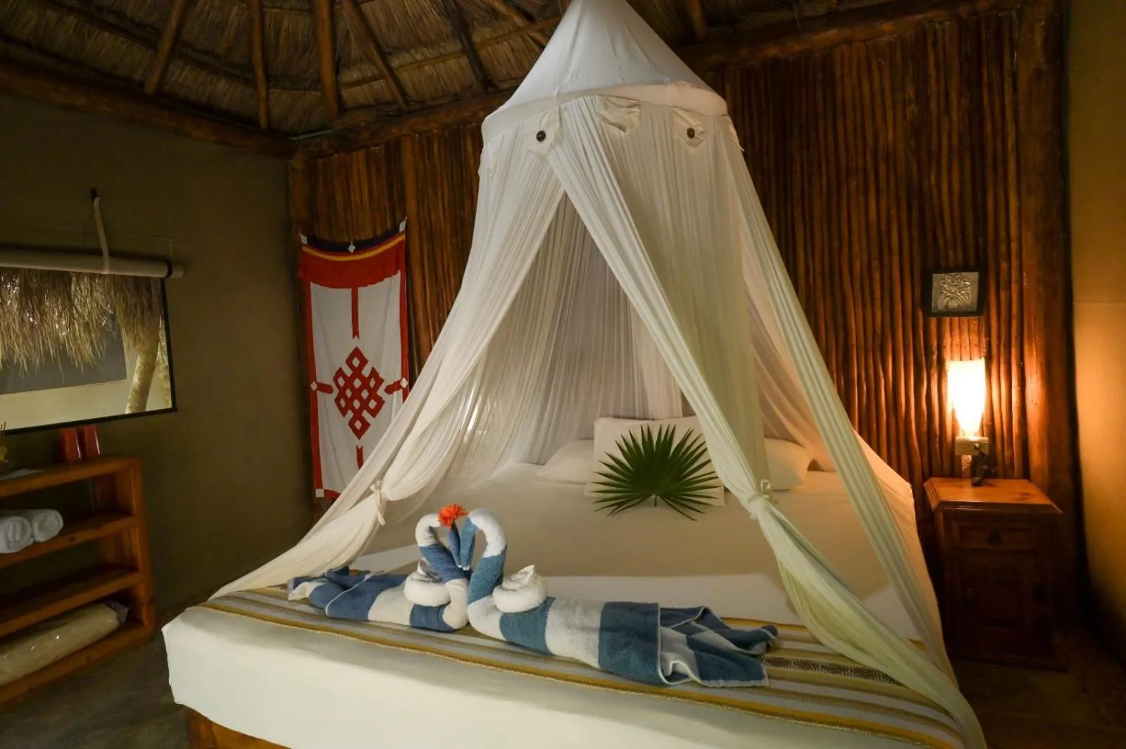 Bed in Akumal Natura Glamping