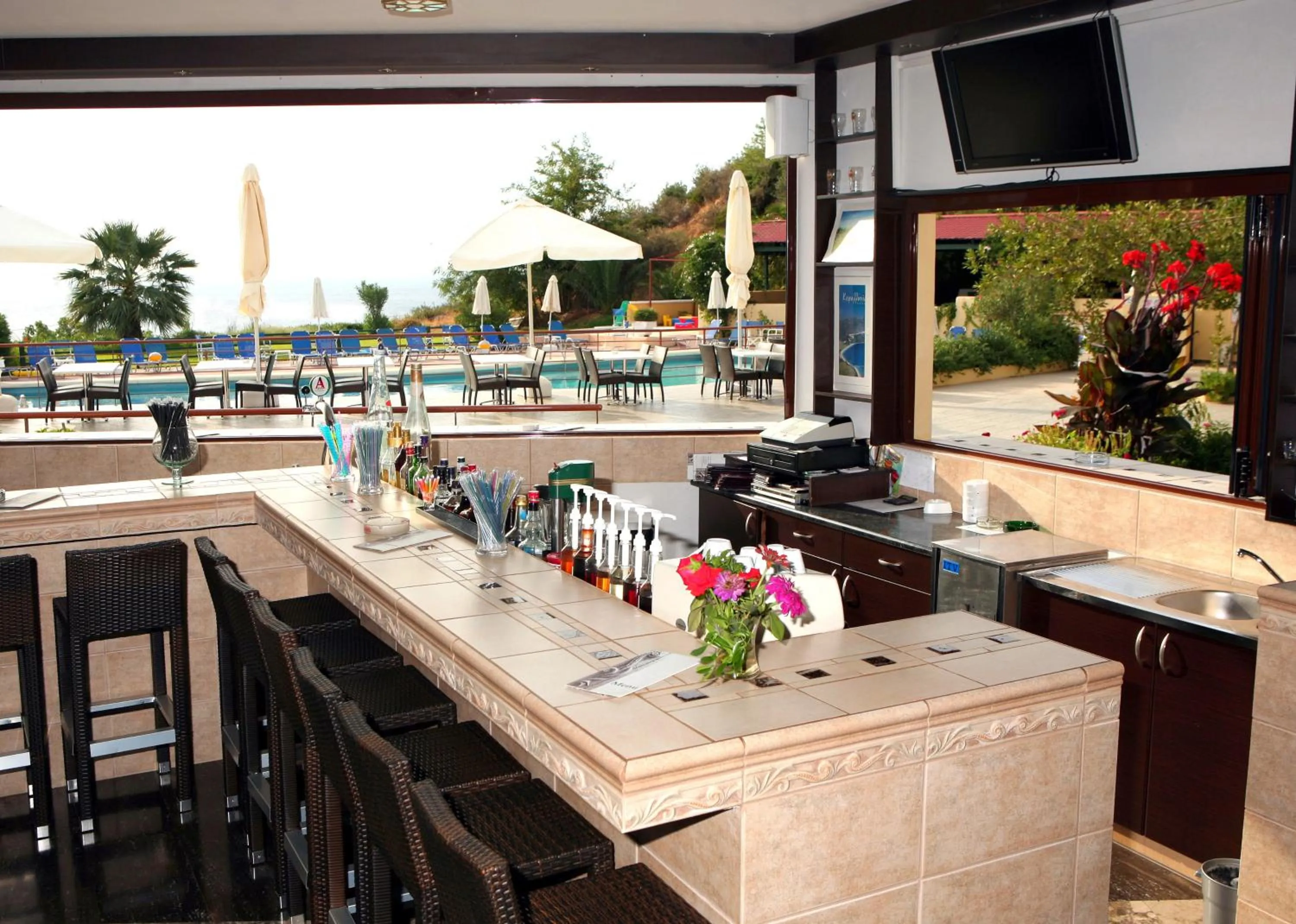 Lounge or bar in Karavados Beach Hotel
