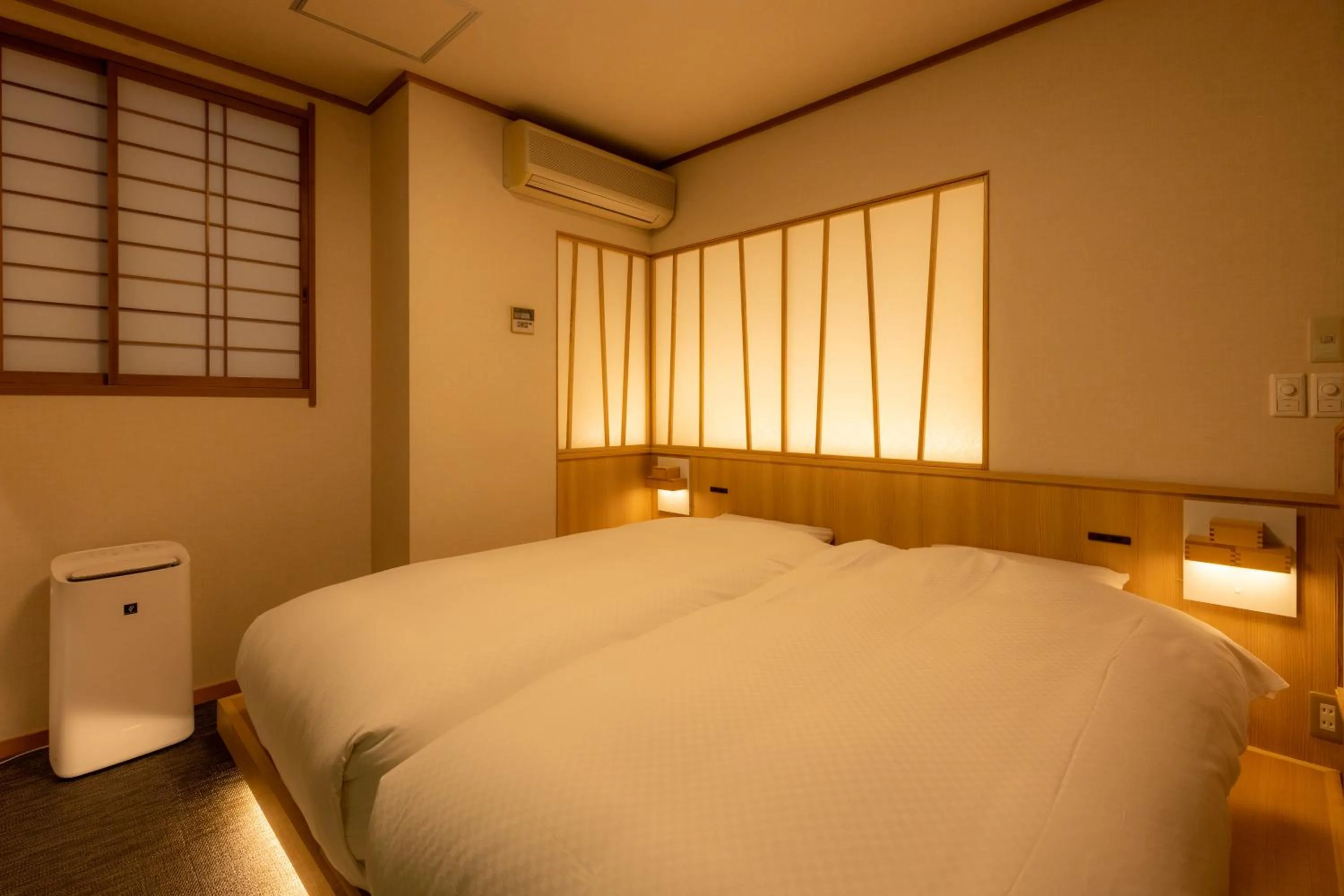 Bed in Sake Hotel Tamakiya