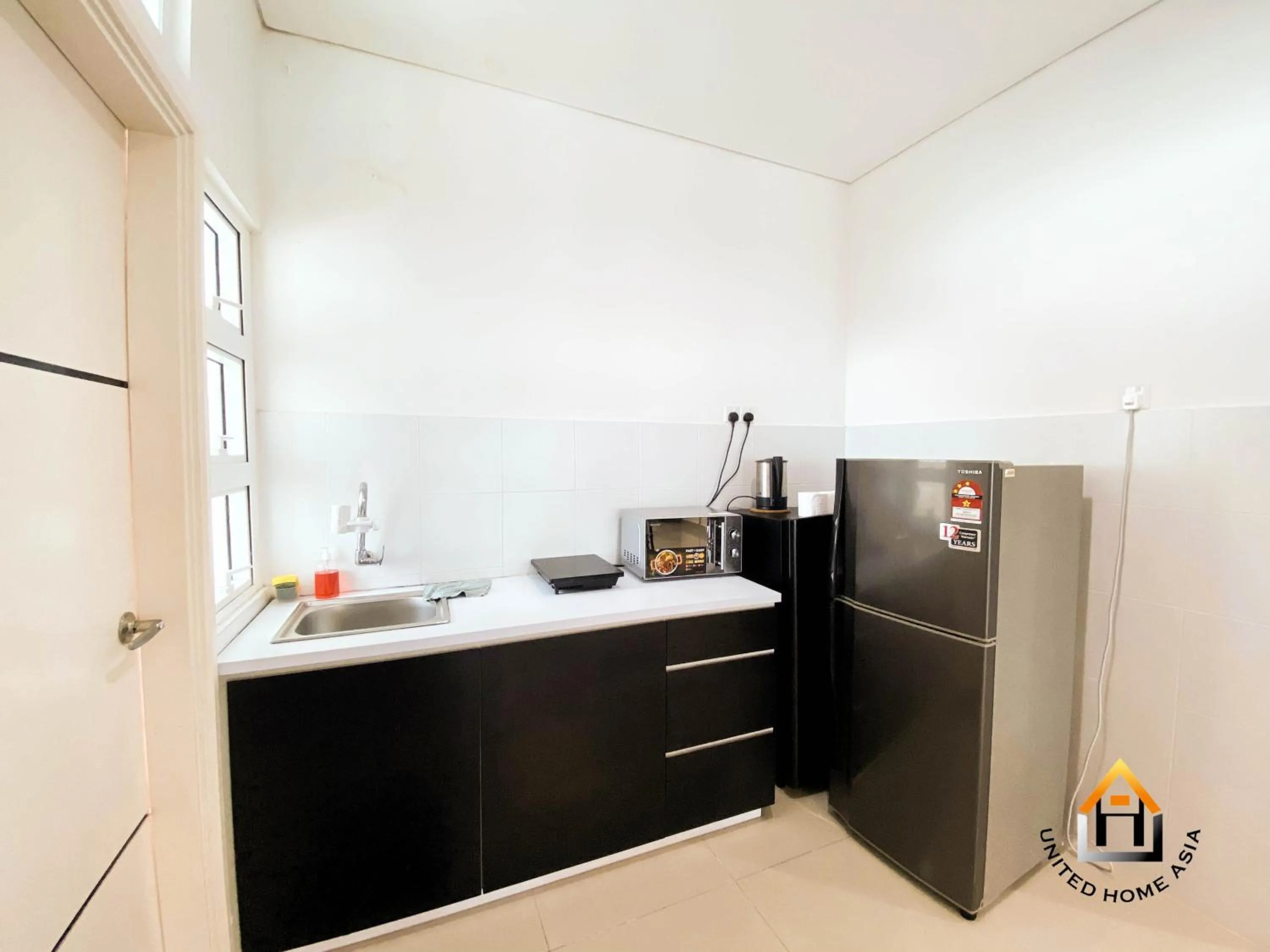Kitchen or kitchenette in Holi 1Medini Themed Suites