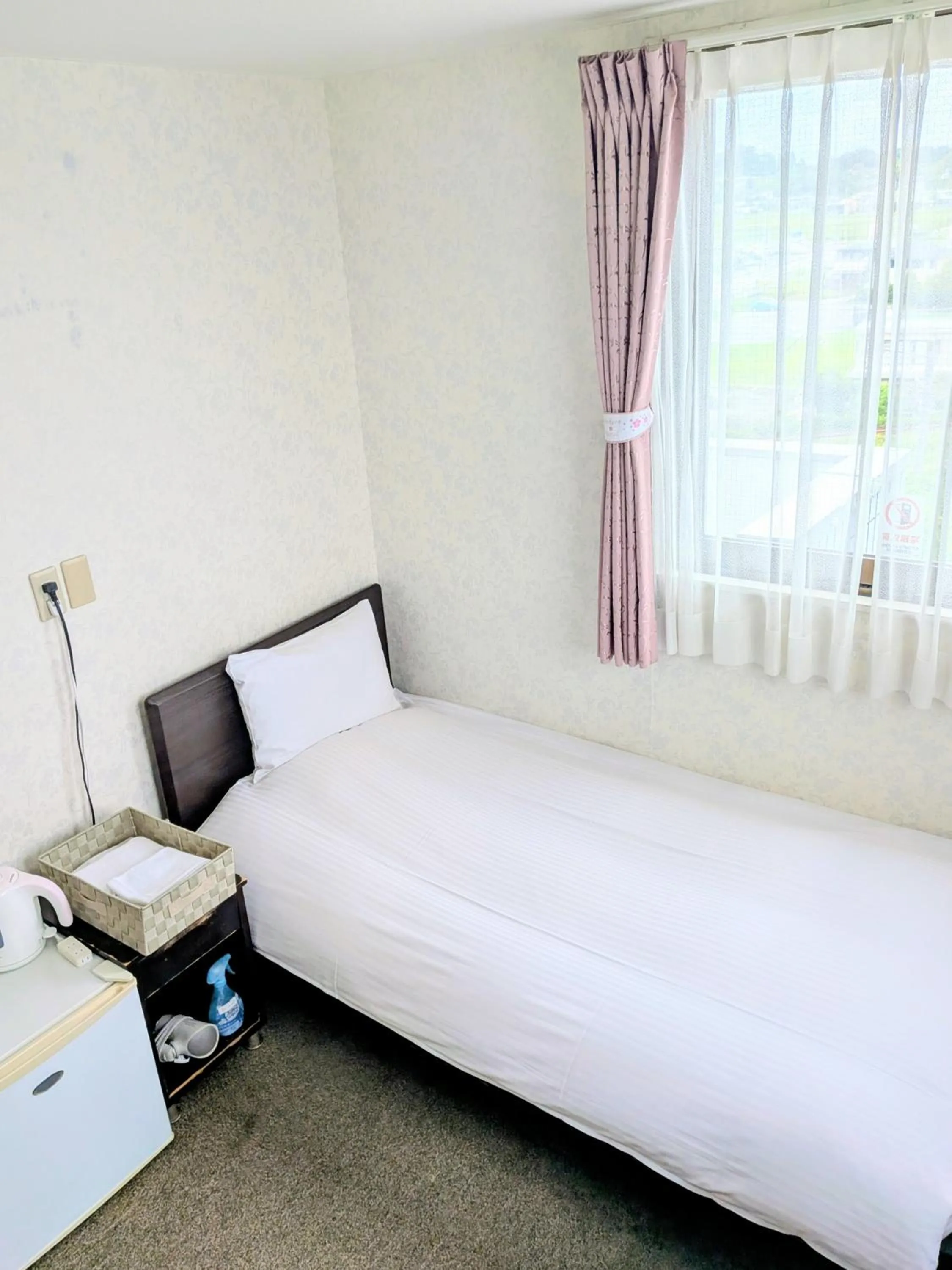 Bed in Sakura Hotel Oami