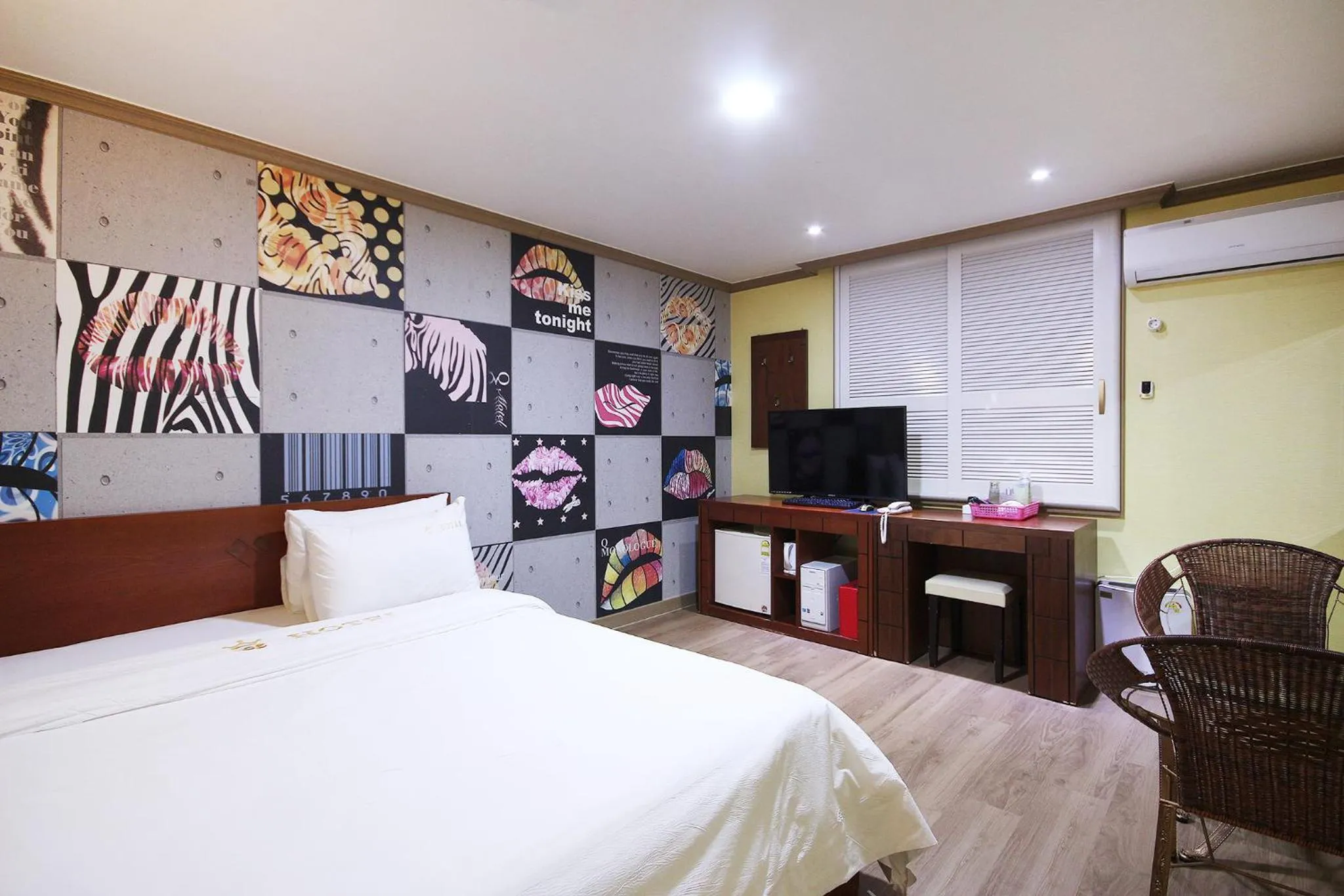 Bed in Happy Q Motel