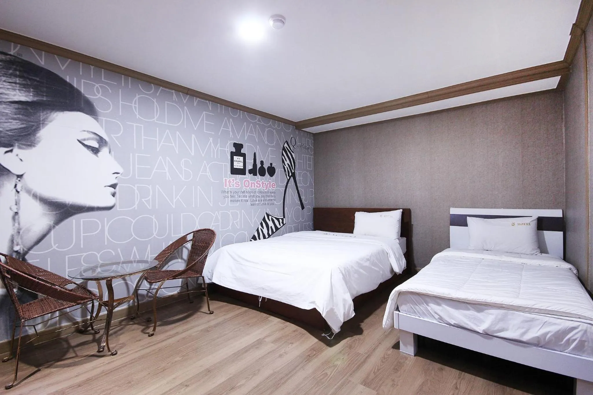 Bed in Happy Q Motel