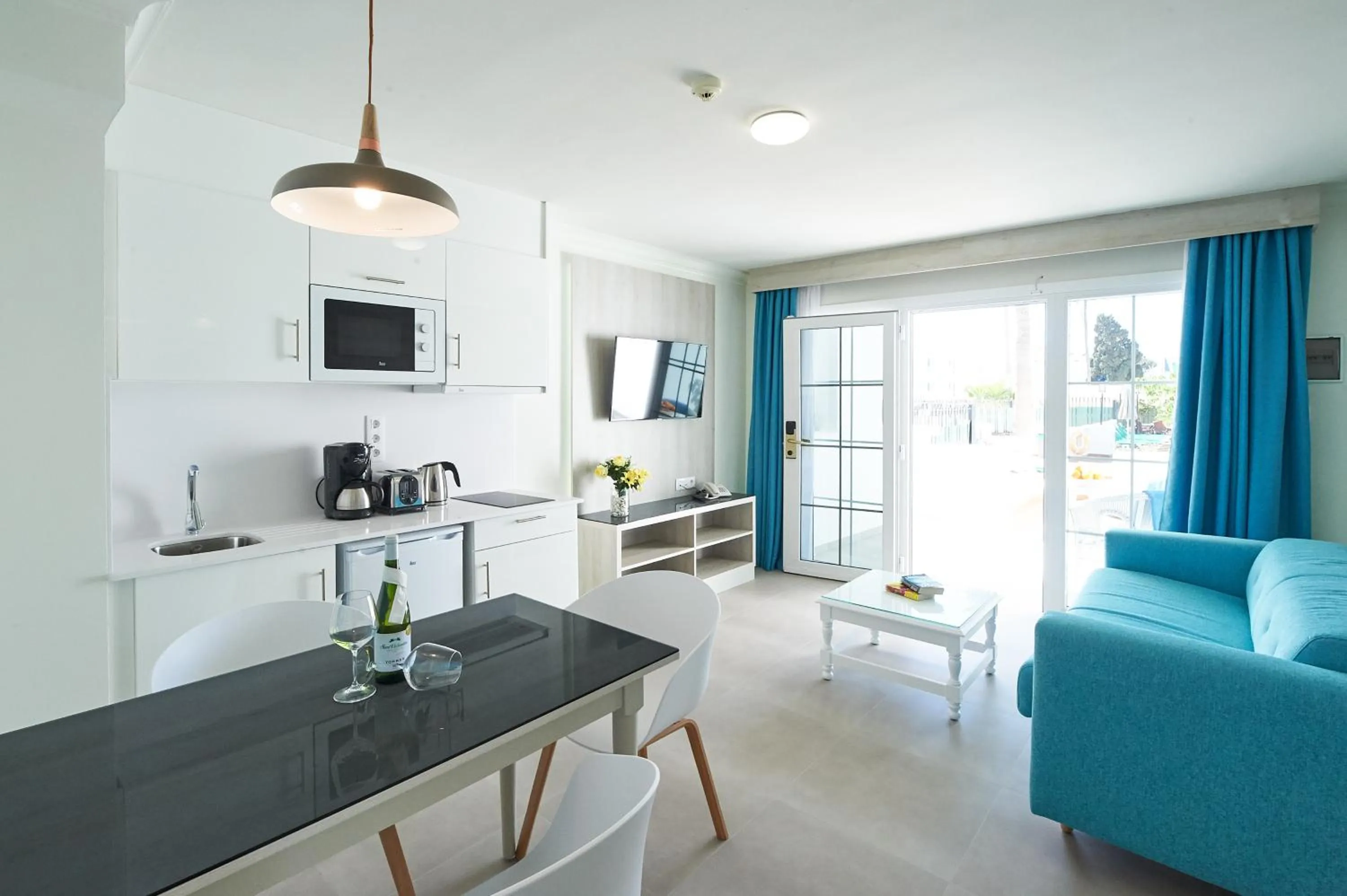 Kitchen or kitchenette in Suite Hotel Montana Club