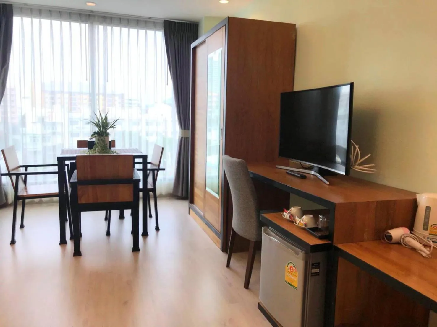 TV and multimedia in Triple B Boutique Residence