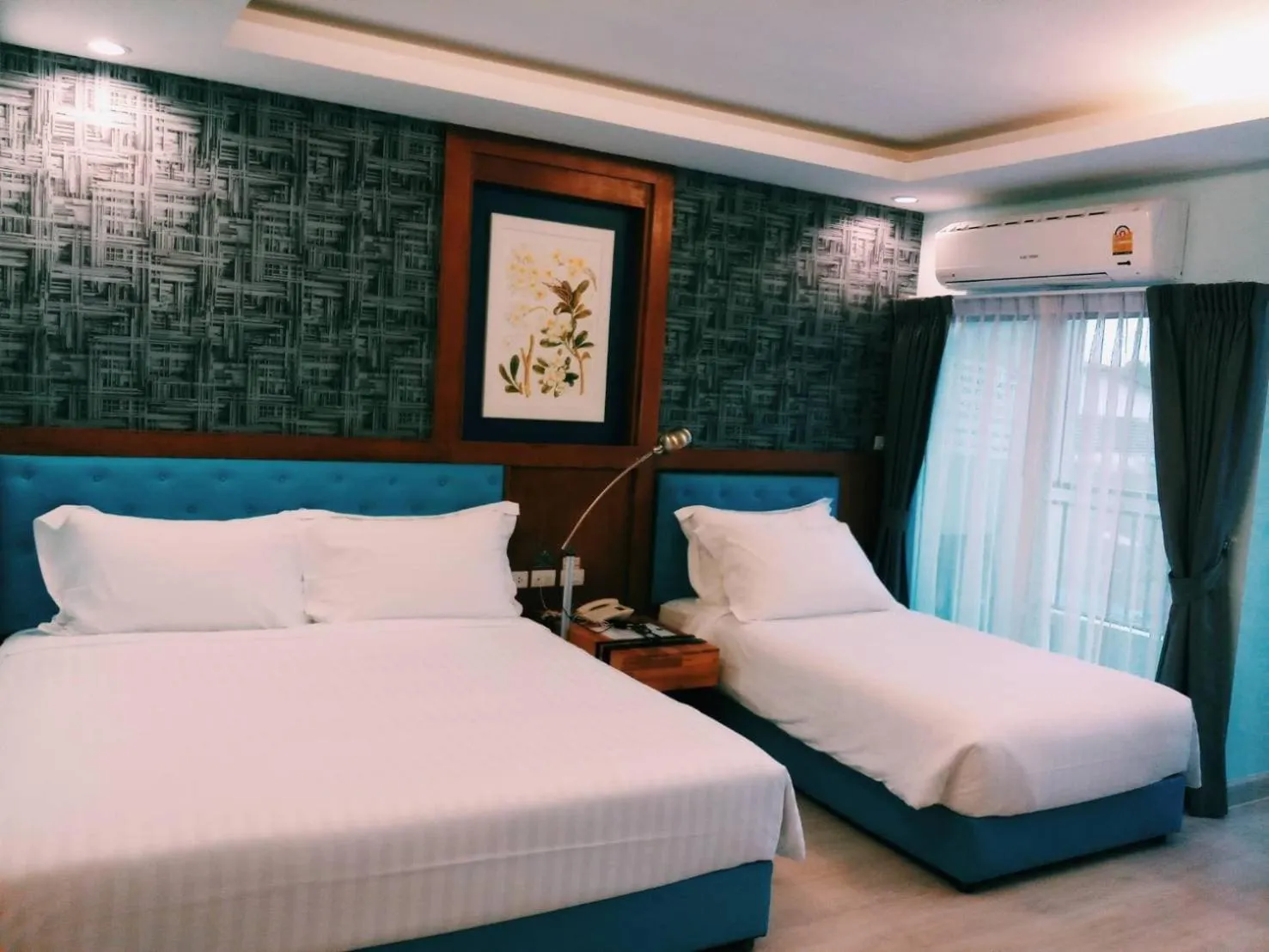 Bed in Triple B Boutique Residence