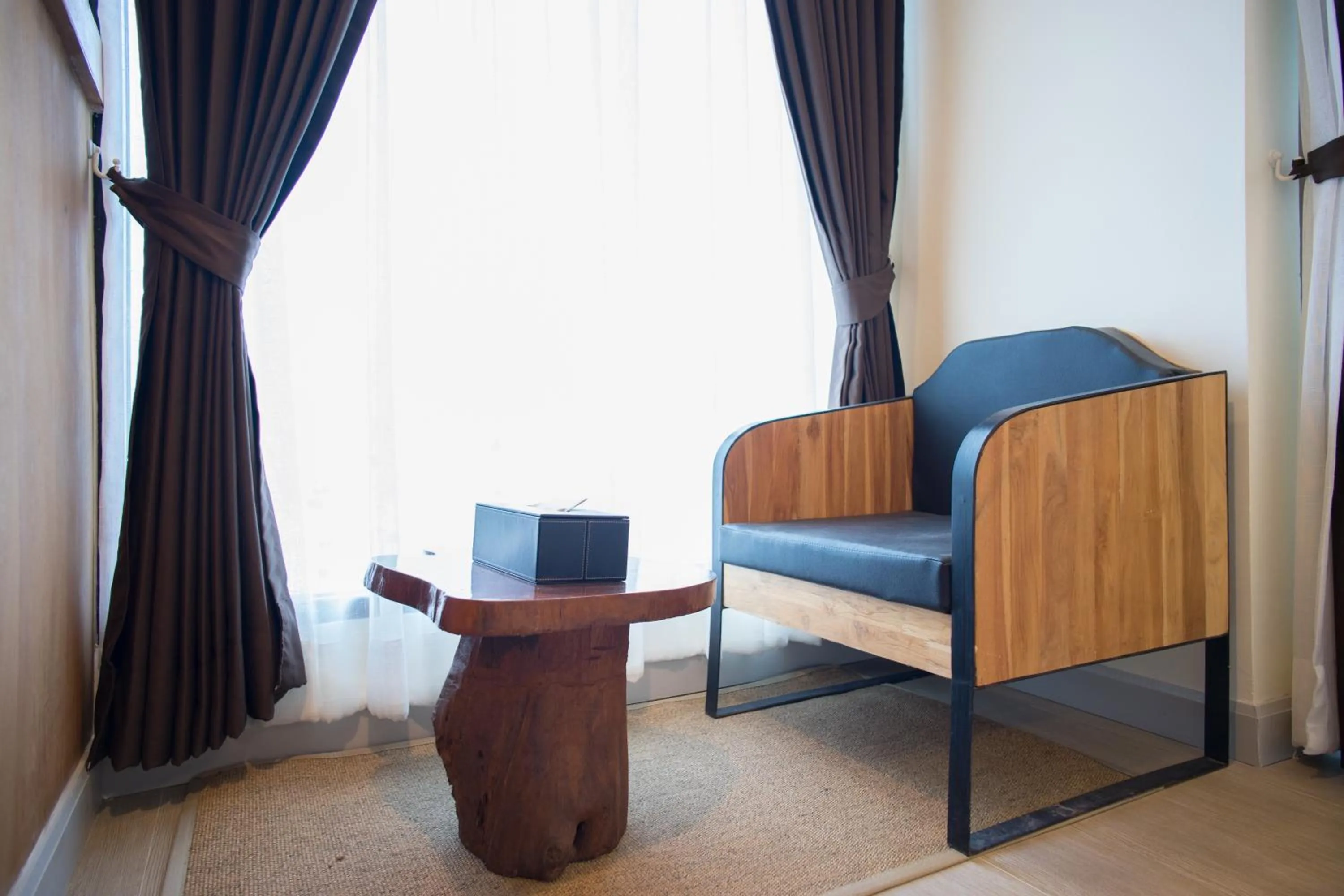 Seating area in Triple B Boutique Residence
