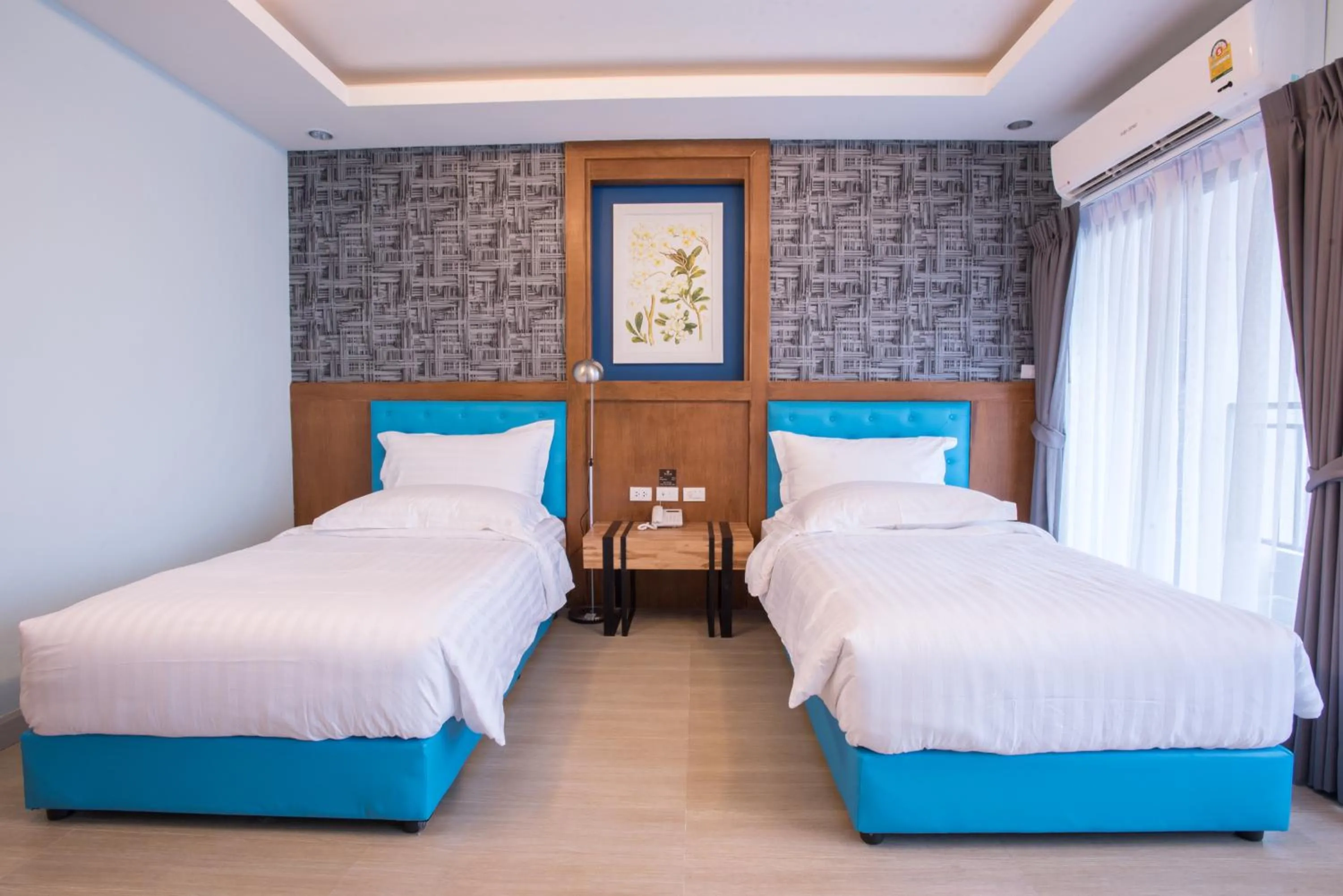 Bed in Triple B Boutique Residence