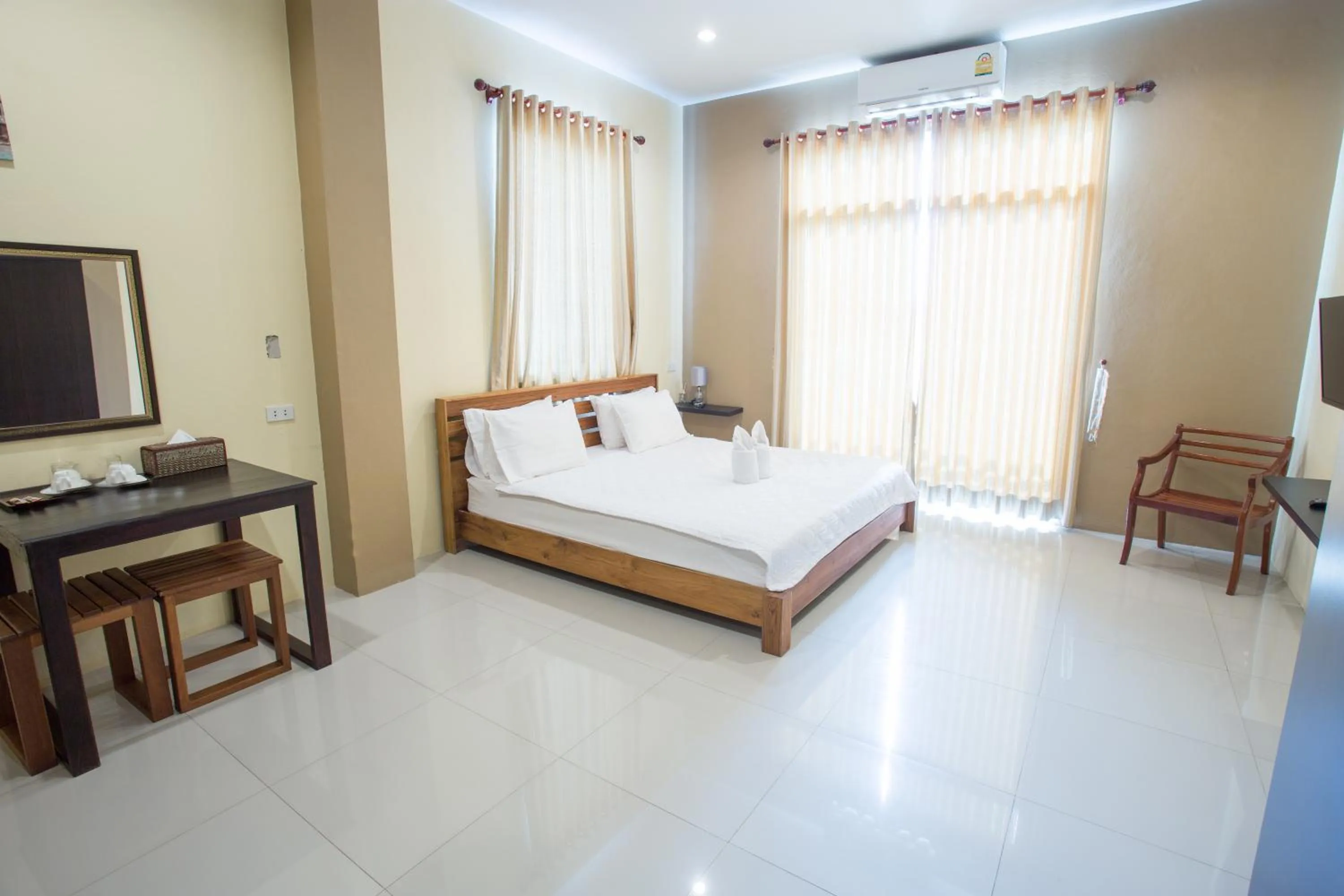 Photo of the whole room, Bed in Aura Residence