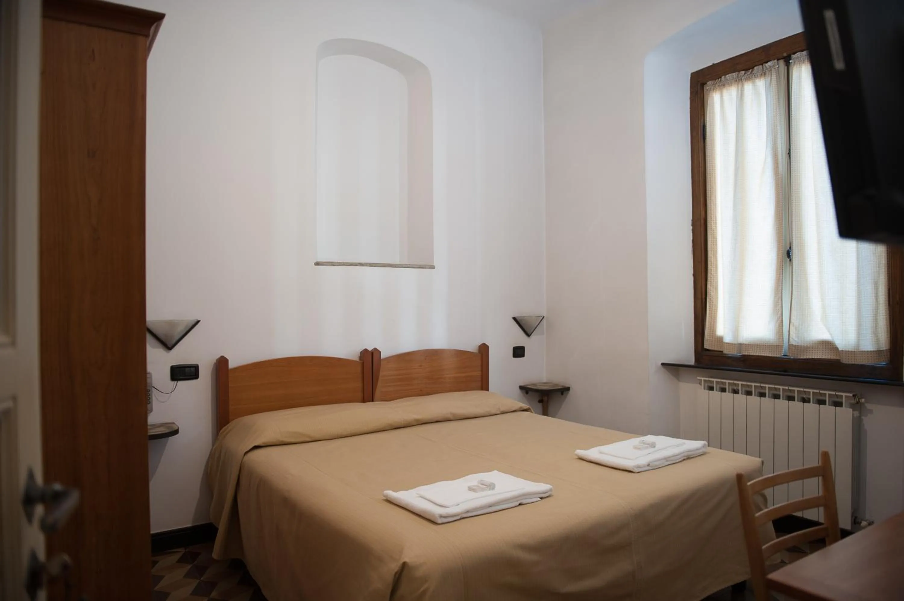 Bedroom in Albergo Vittoria