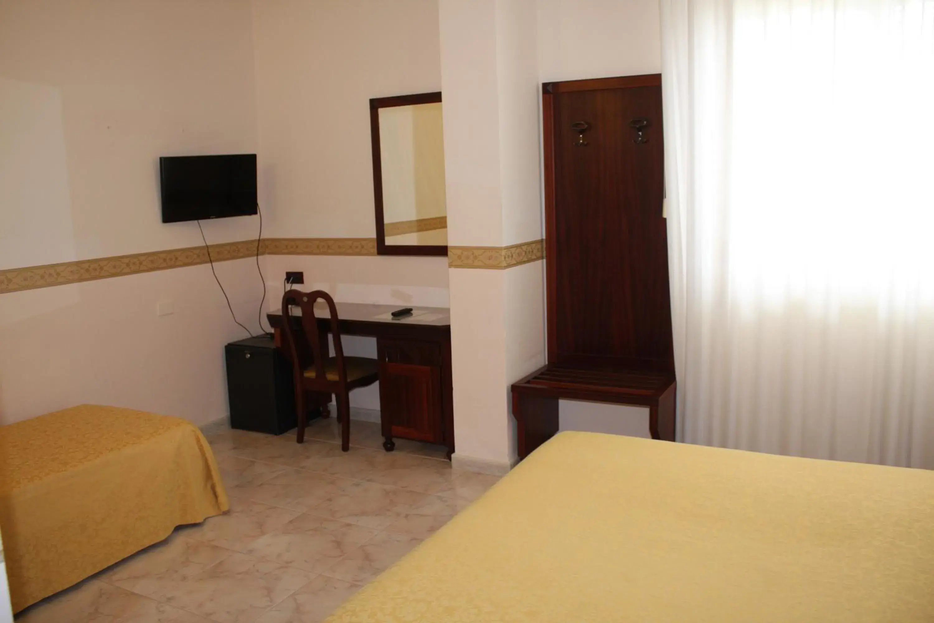 Triple Room in Grand Hotel degli Angeli Triple Room in Grand Hotel degli Angeli