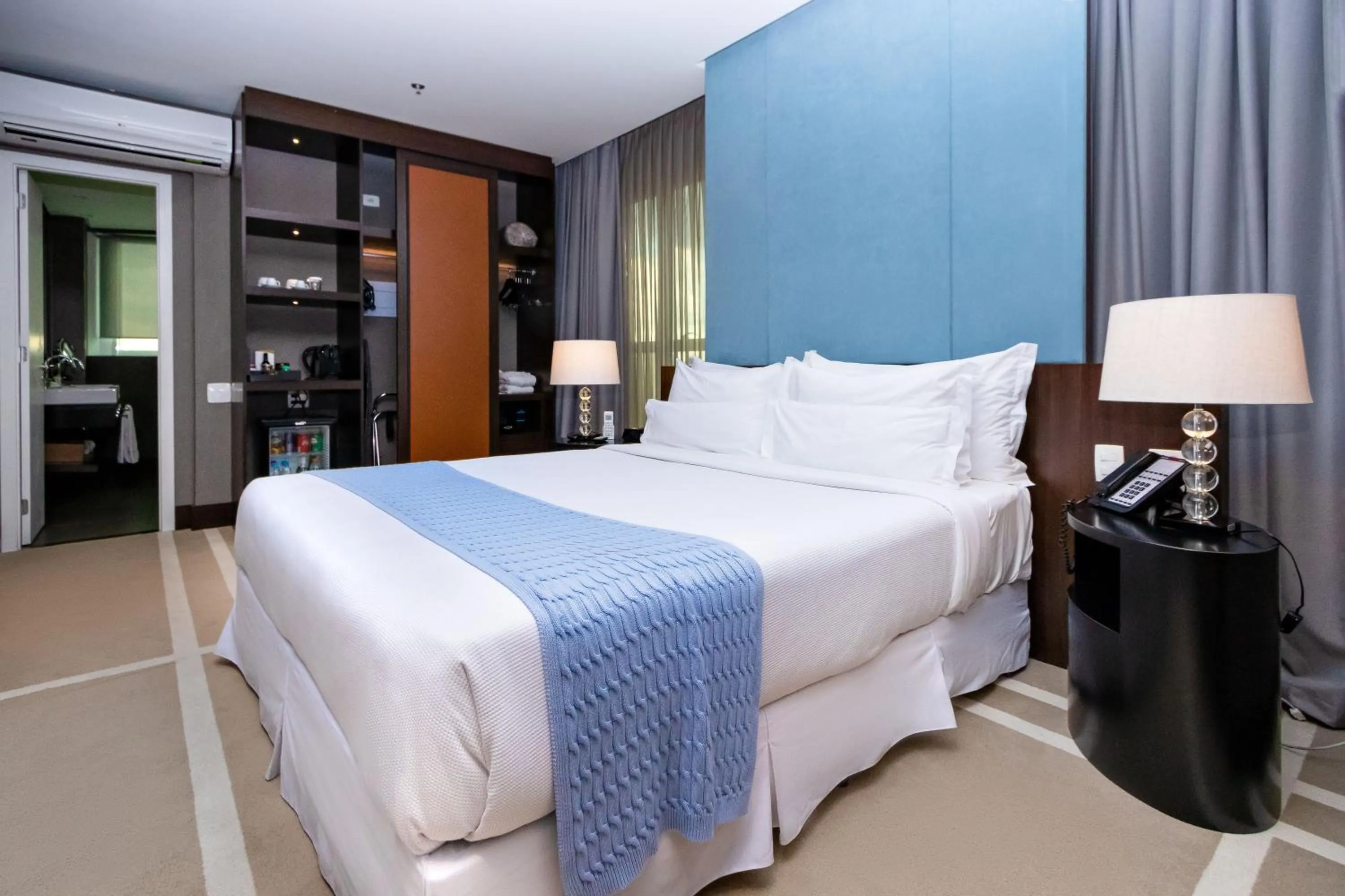 Bed in Hotel Cadoro São Paulo