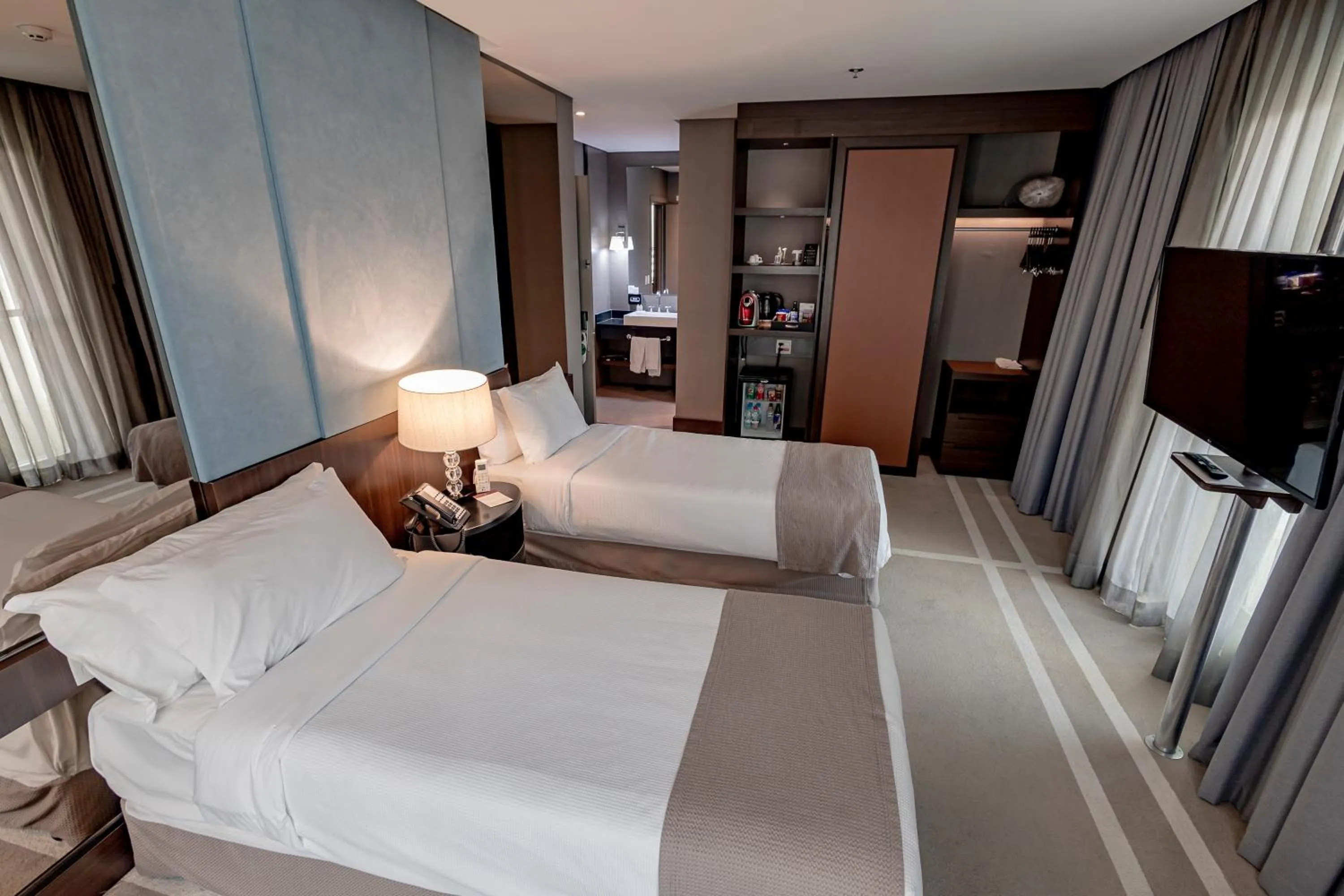 Bed in Hotel Cadoro São Paulo