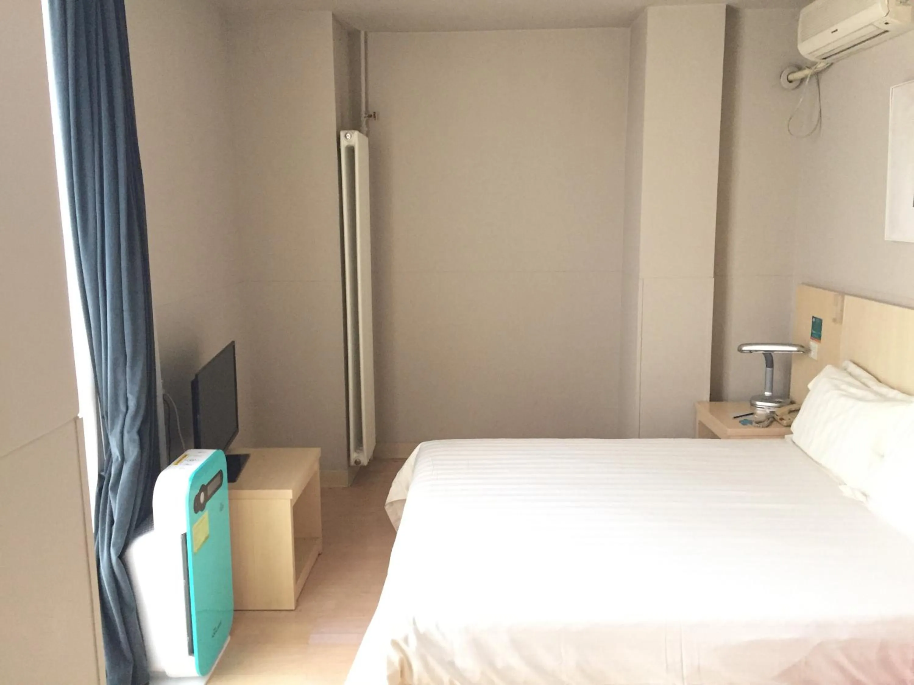 Bedroom in Jinjiang Inn Beijing South Station