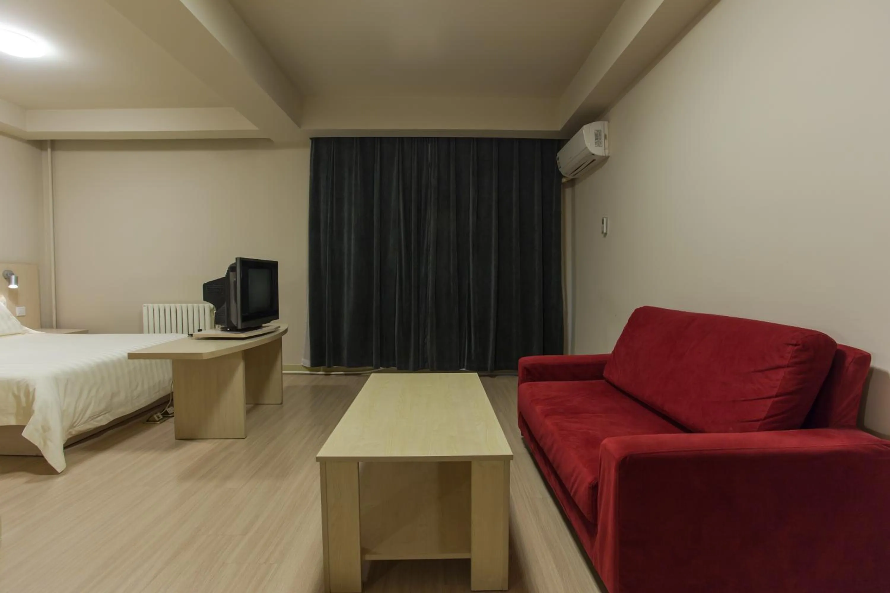 Bed in Jinjiang Inn Beijing Hepingmen