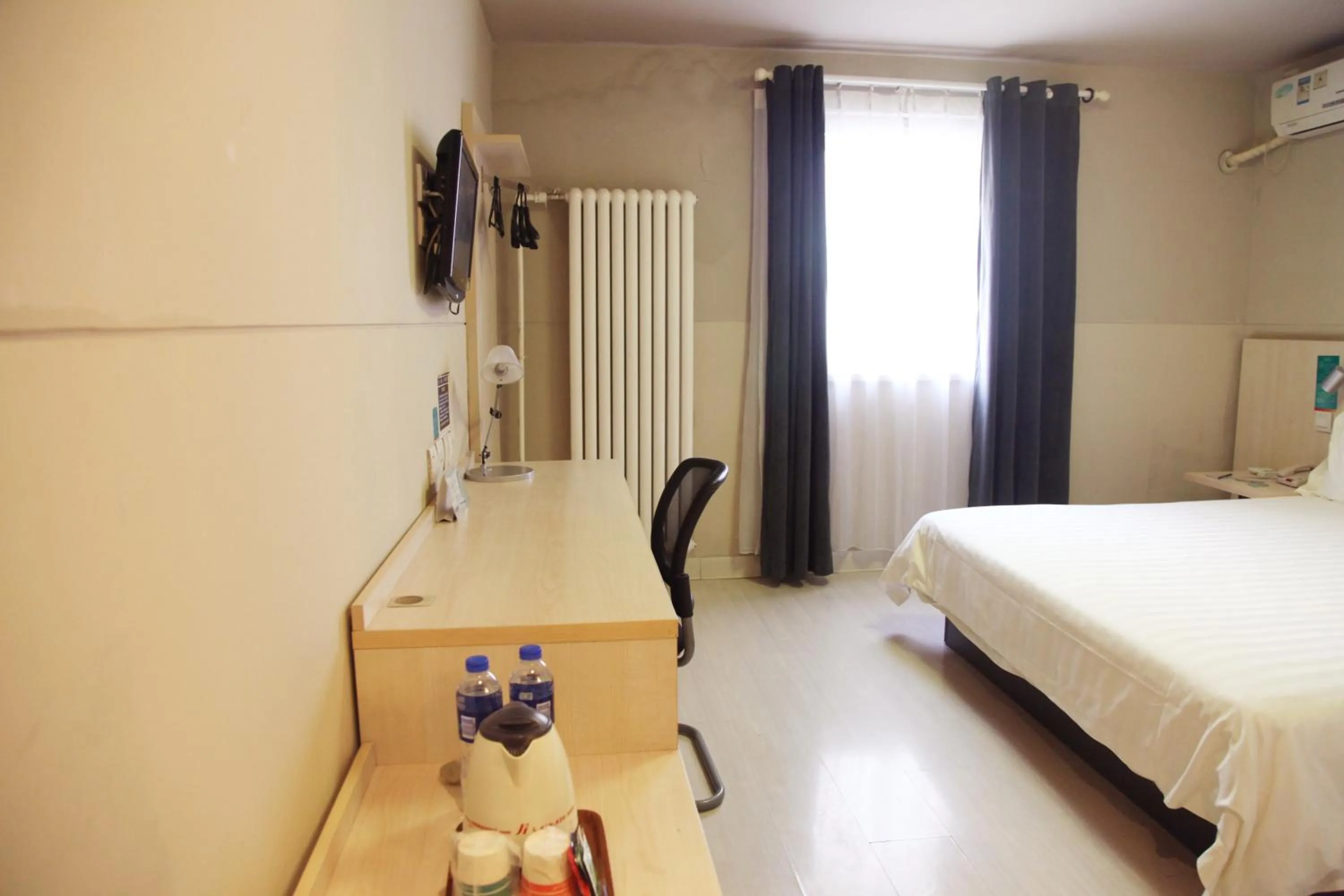 Bed in Jinjiang Inn Beijing Zoo