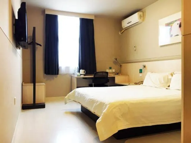 Bed in Jinjiang Inn Taizhou Xinghua Dainan Town Government