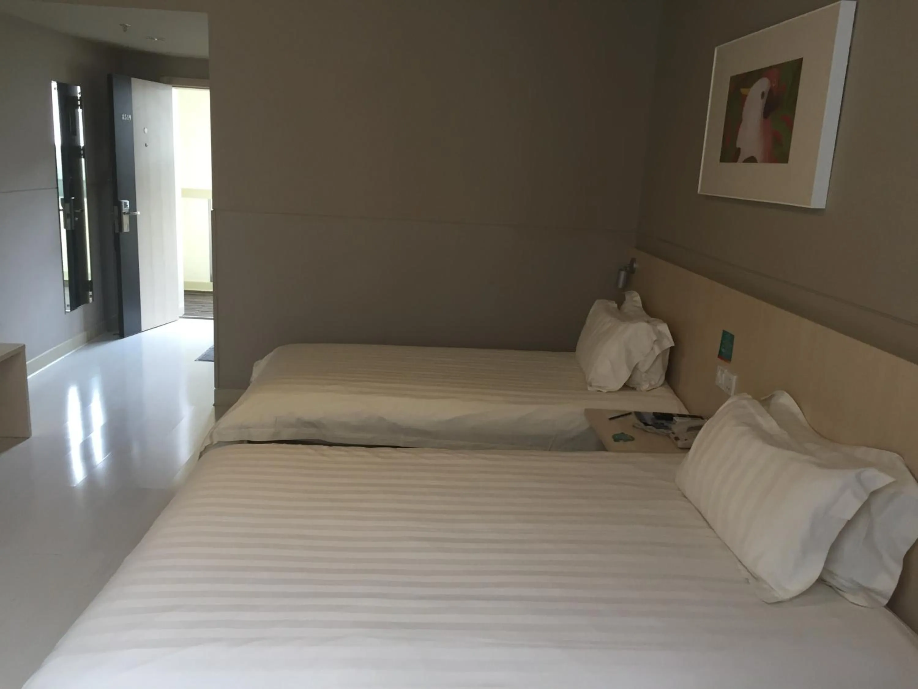 Bed in Jinjiang Inn Lijiang Ancient City Qixing Street