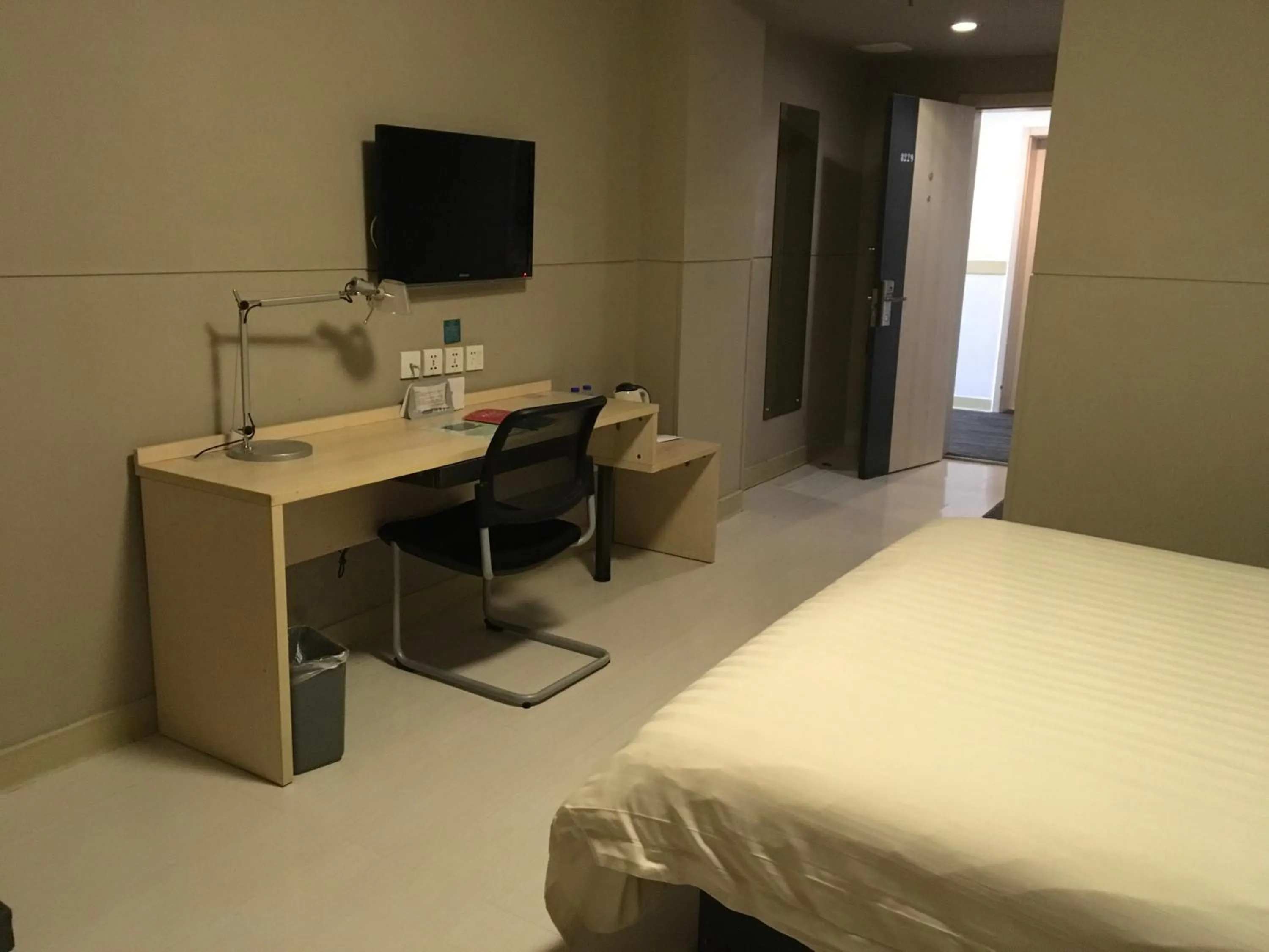 Bed in Jinjiang Inn Lijiang Ancient City Qixing Street