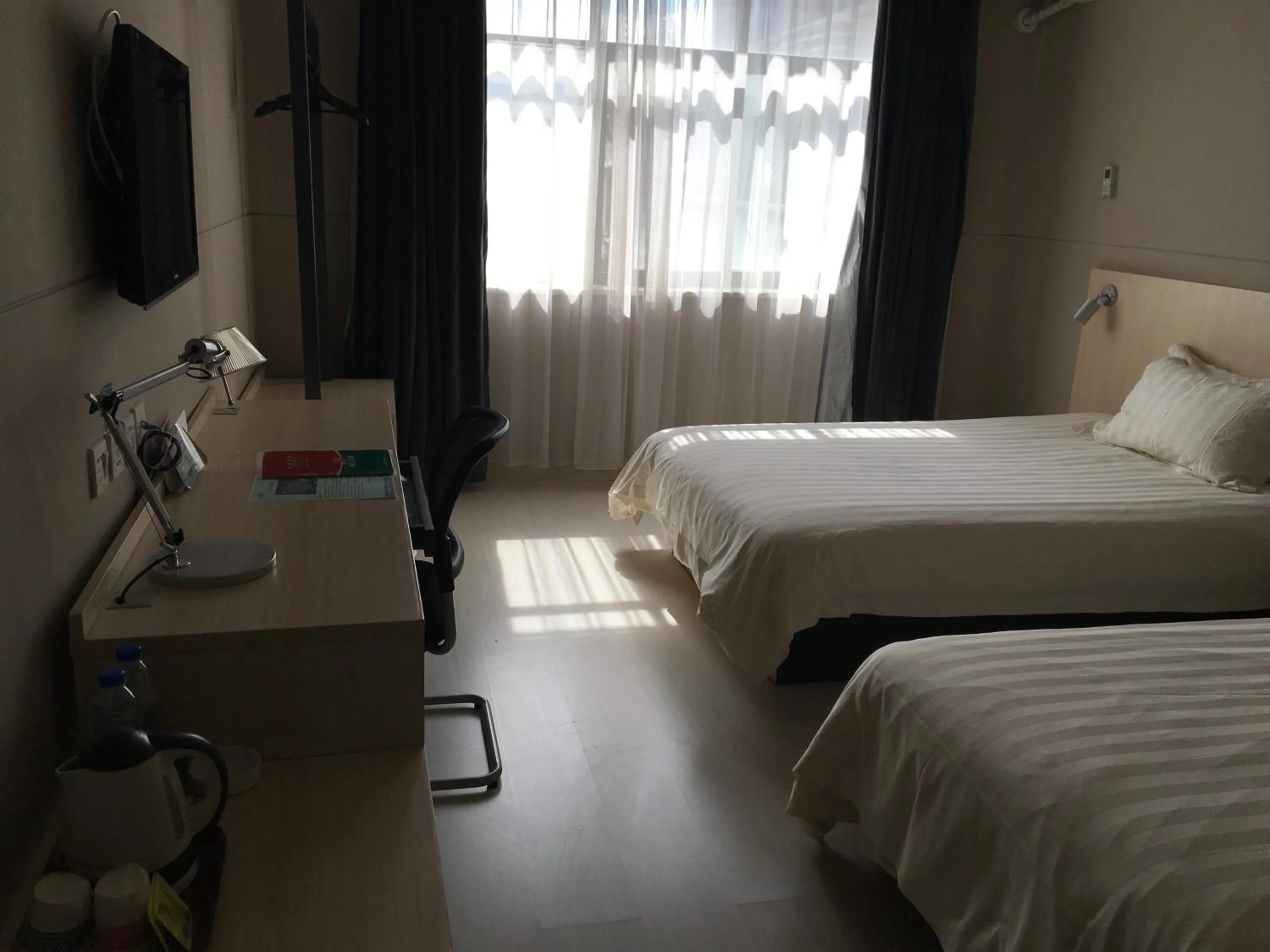 Bed in Jinjiang Inn Lijiang Ancient City Qixing Street