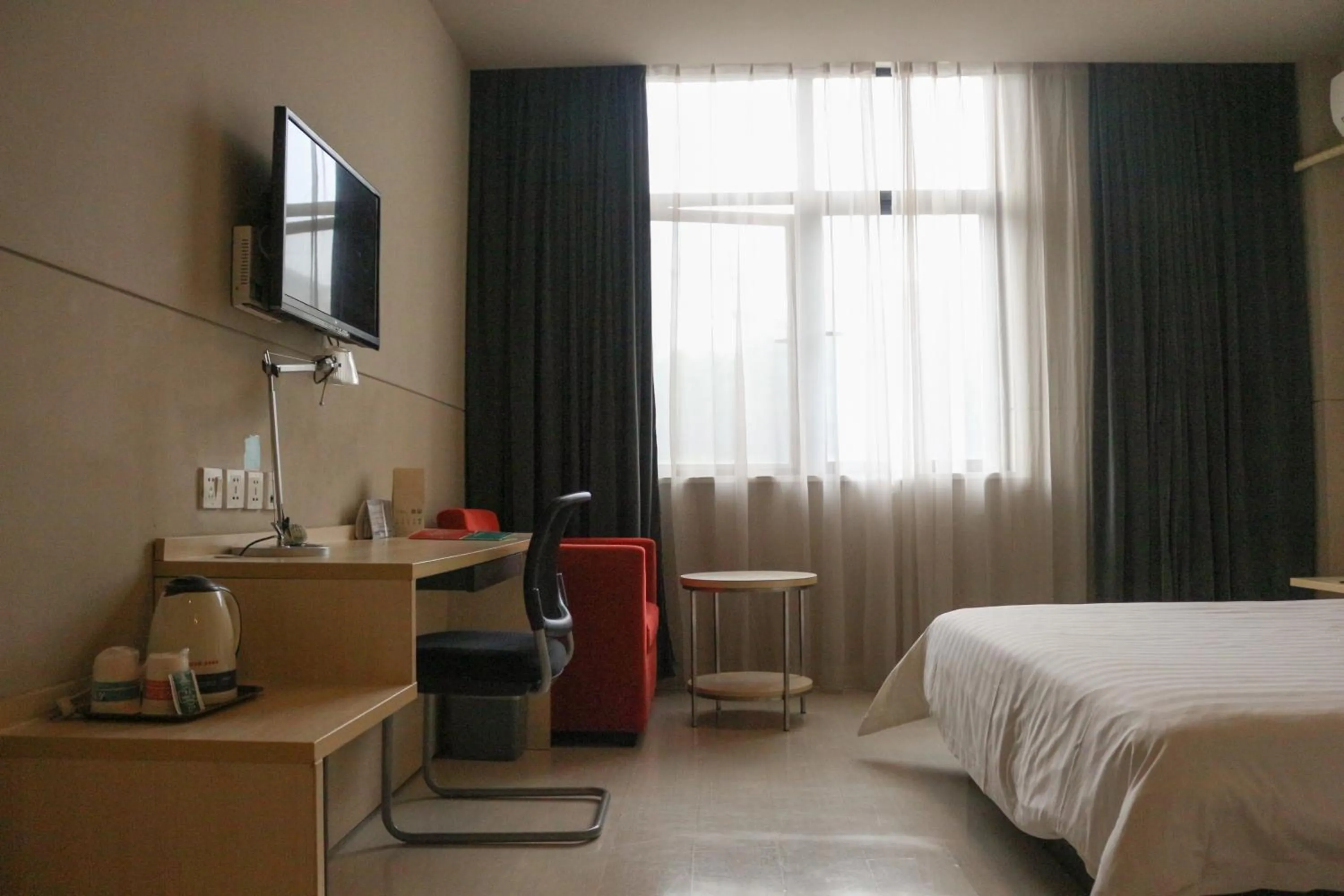 Bed in Jinjiang Inn Shanghai Chedun Studios