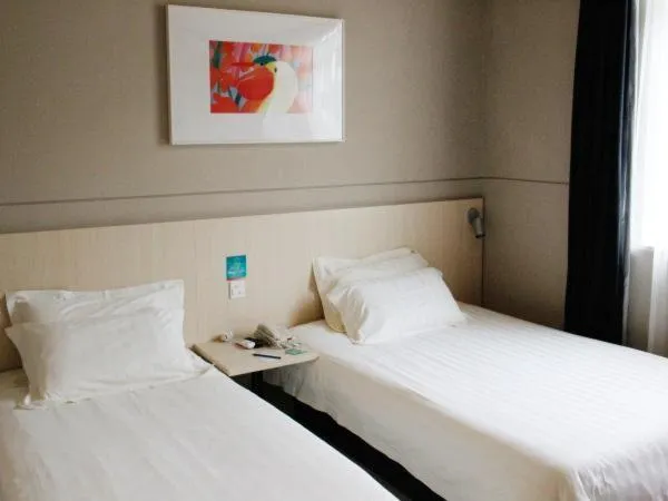 Bed in Jinjiang Inn Chengdu Dufu Thatched Cottage