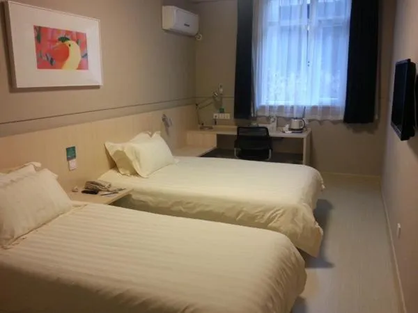 Bed in Jinjiang Inn Chengdu Dufu Thatched Cottage