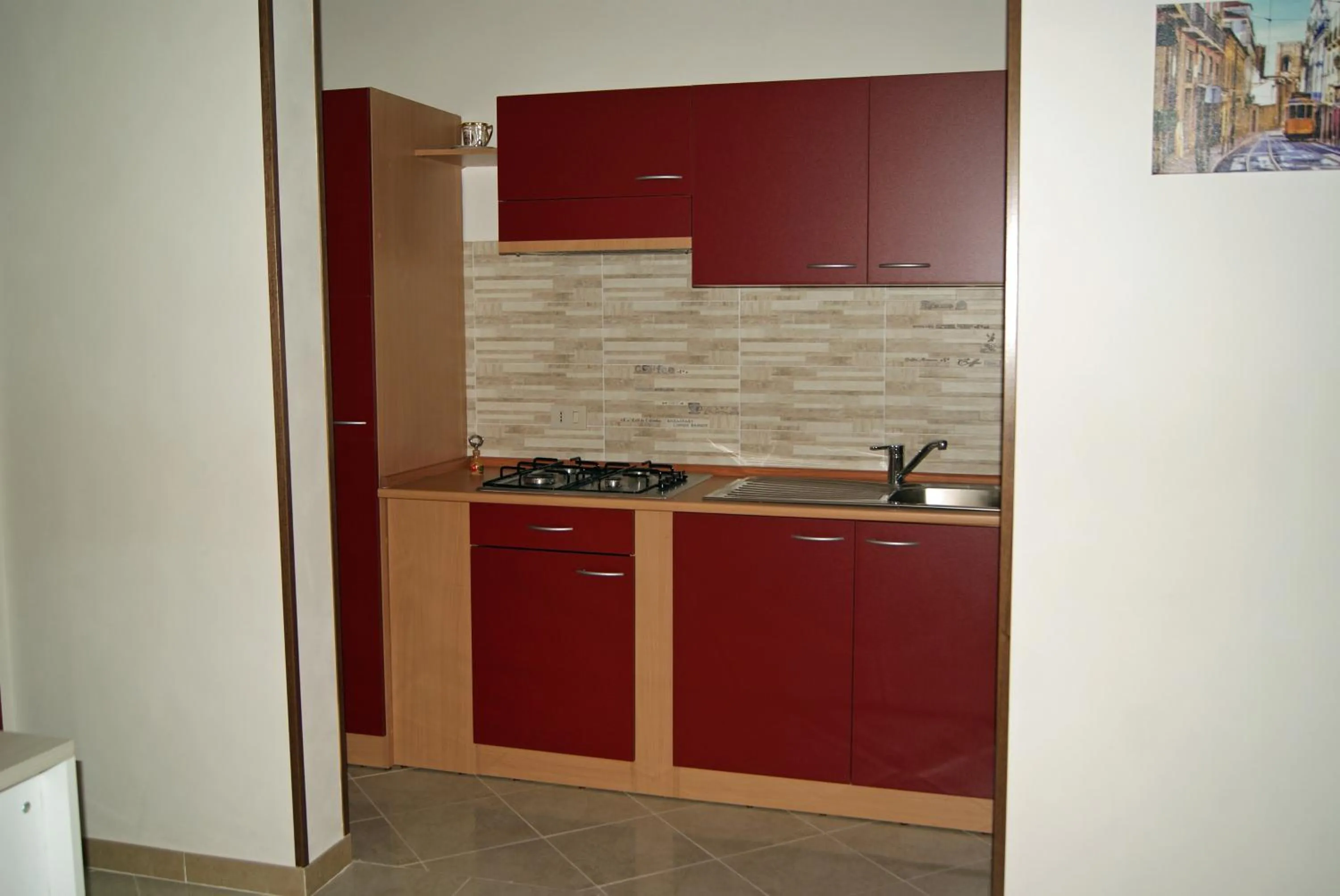 Communal kitchen in B&B Isole Dello Stagnone