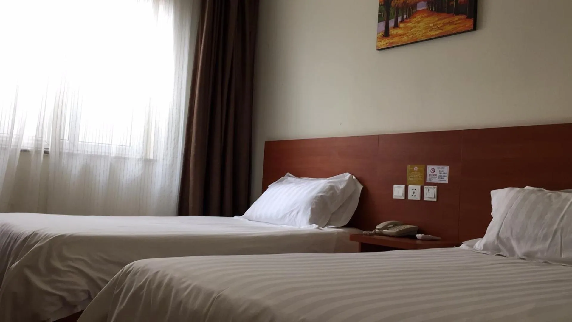 Decorative detail, Bed in Goldmet Inn Beojing Capital Airport Xinguozhan