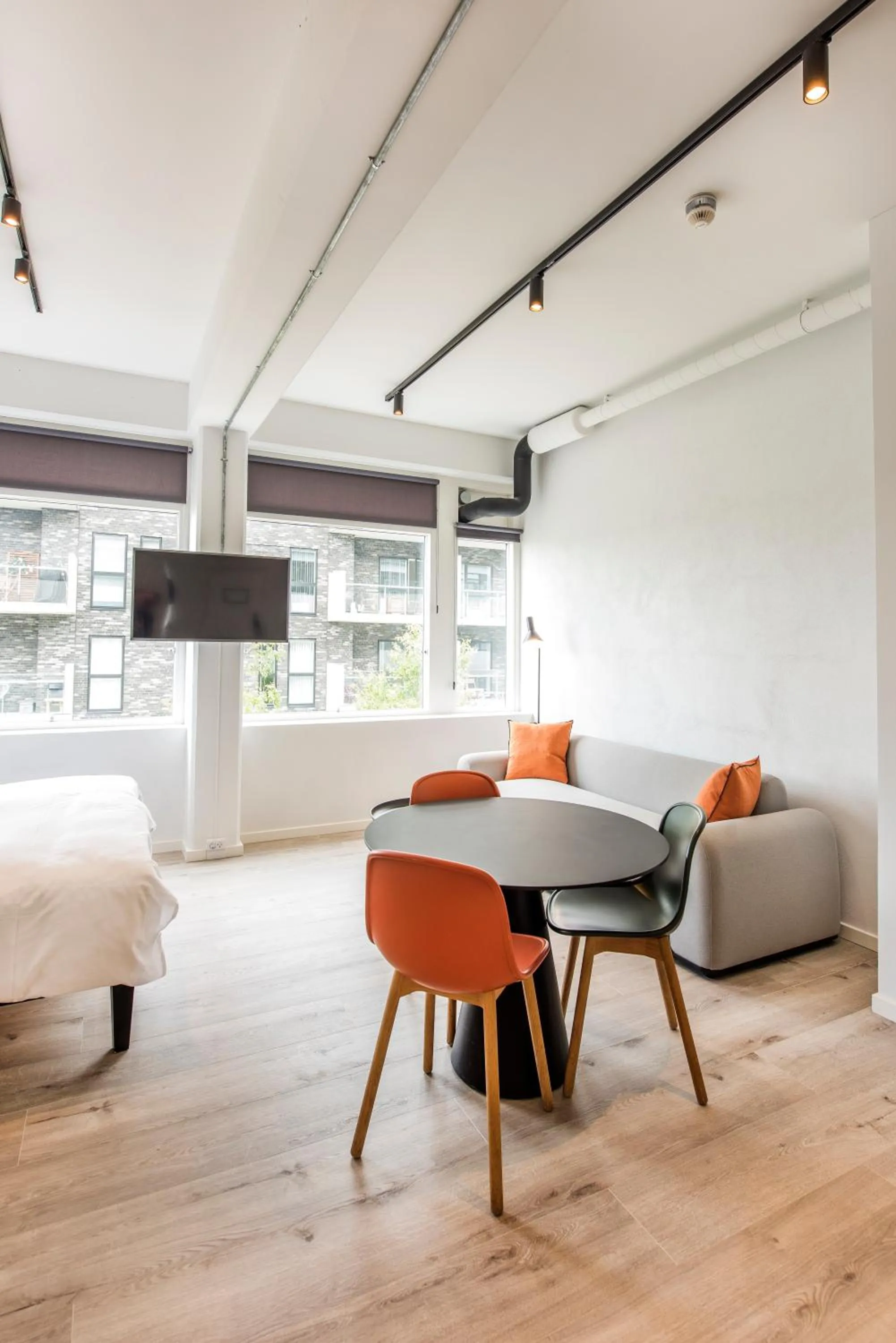 Living room, Bed in CPH Studio Hotel