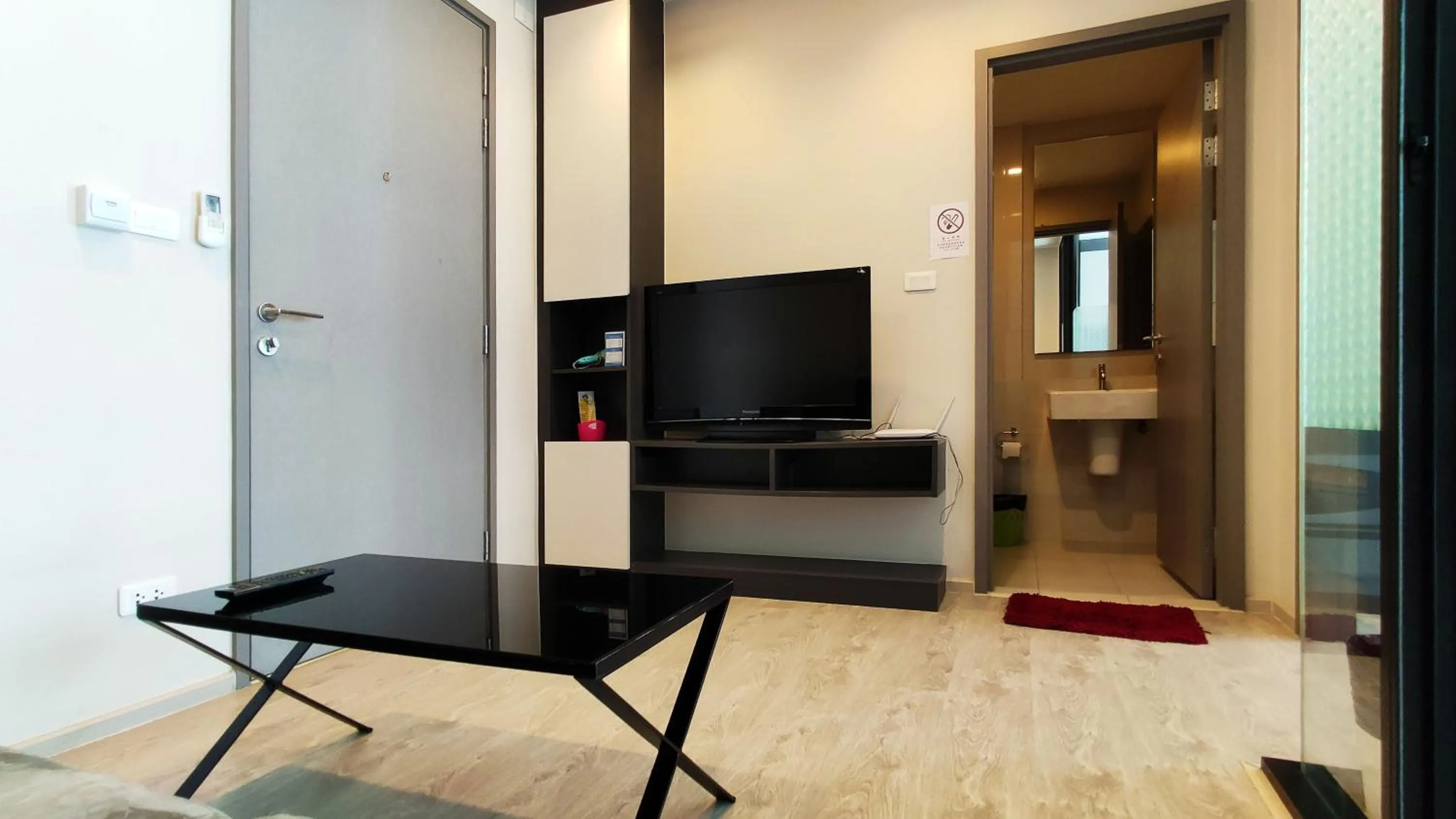 Living room in Many Holiday The Base Condo