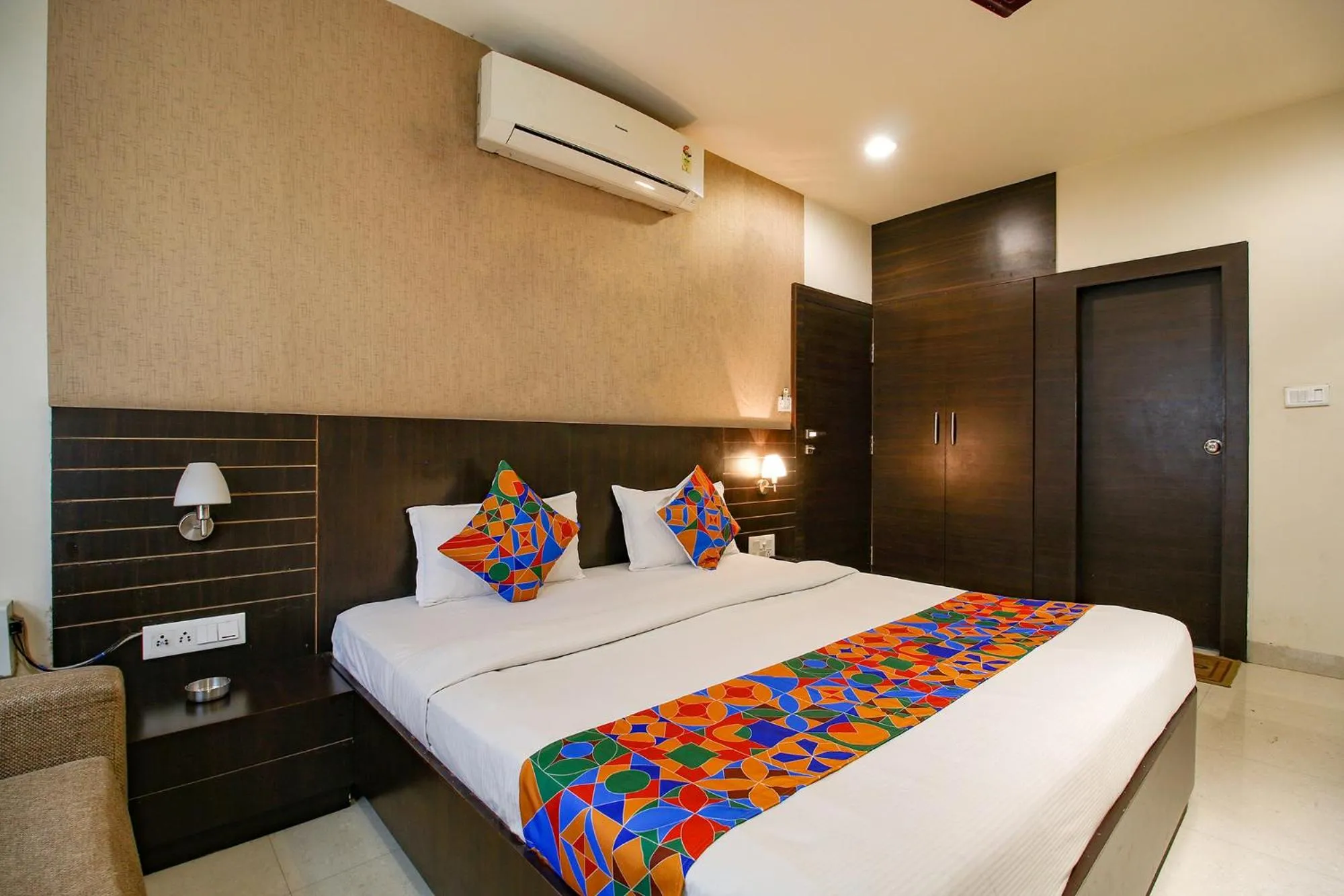 Bed in FabHotel Kamla Regency