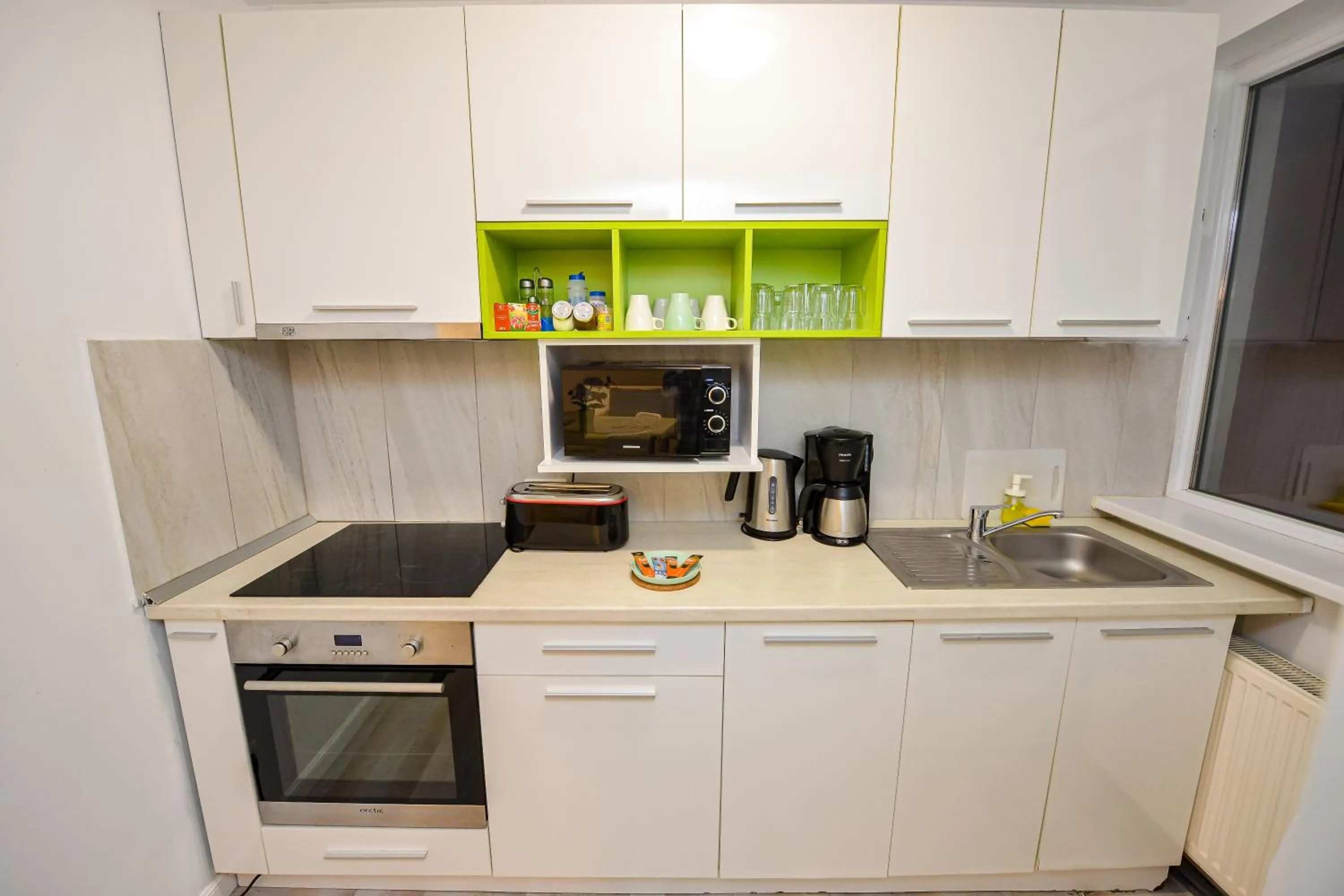 Kitchen or kitchenette in CityScape Bucharest