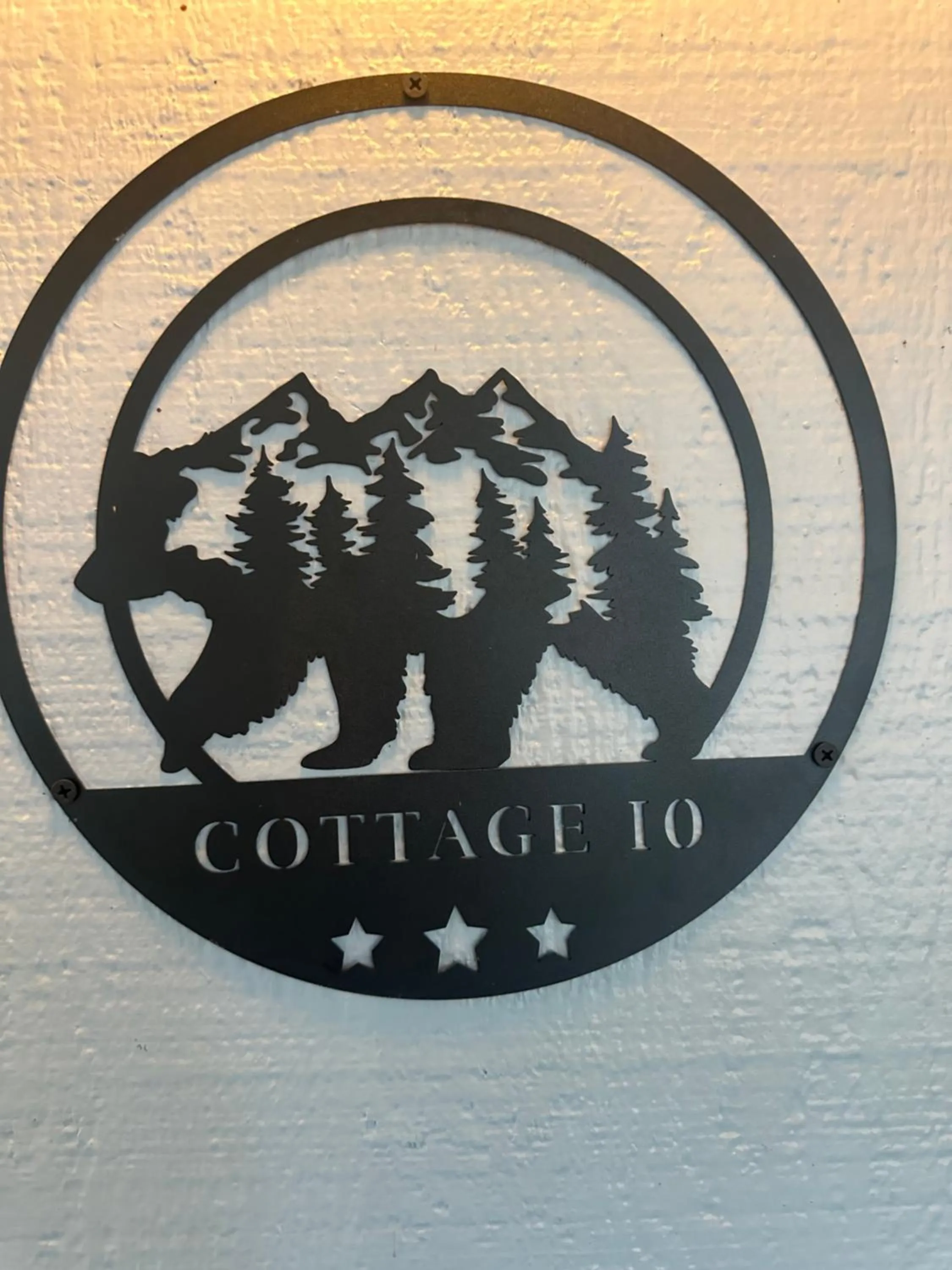 Property logo or sign in The Pines Inn and Cottages