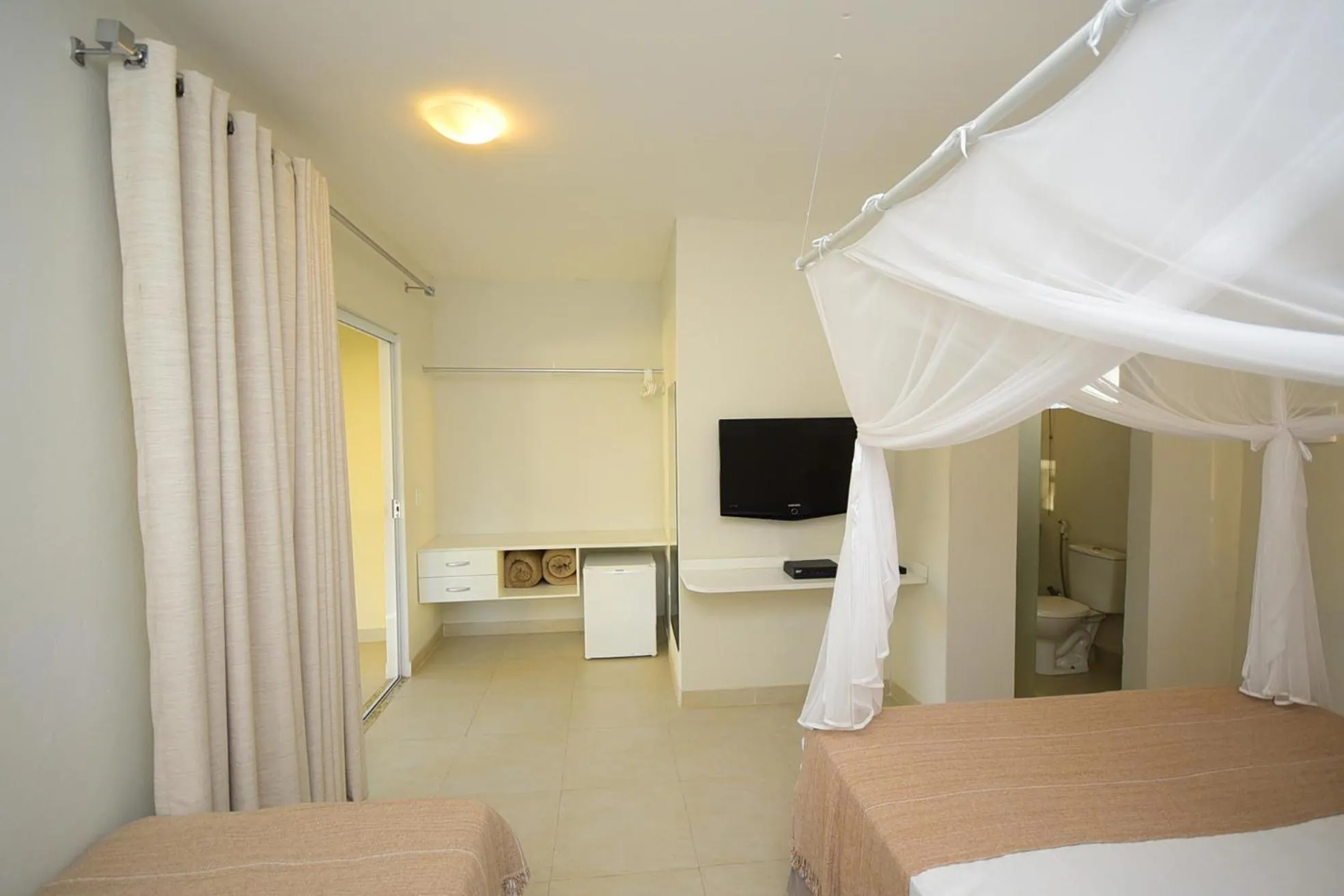 Bed in Quintal da Arte Suites
